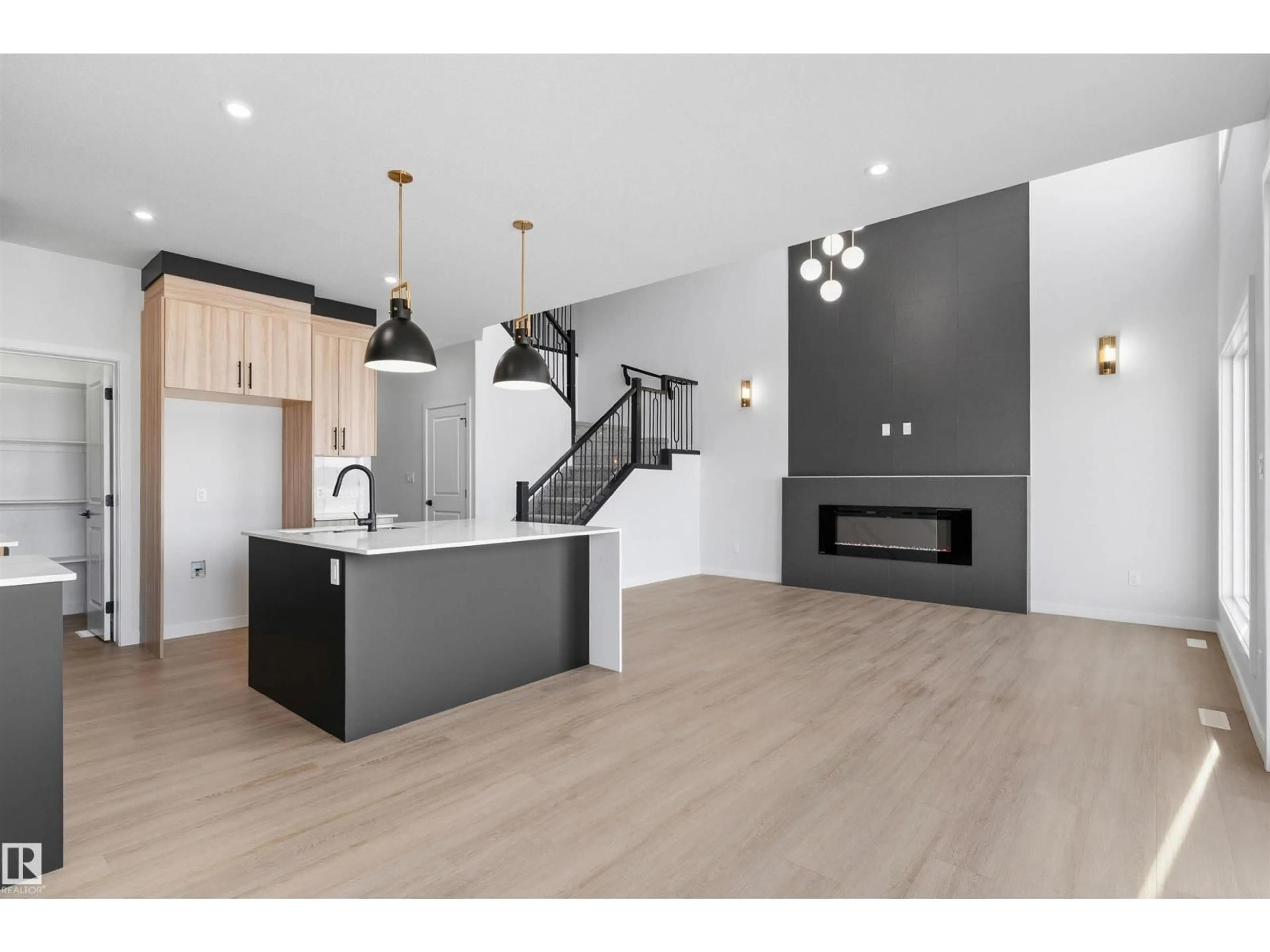 Open concept kitchen, wood/laminate floor for 120 25 ST, Edmonton Alberta T6X3K3