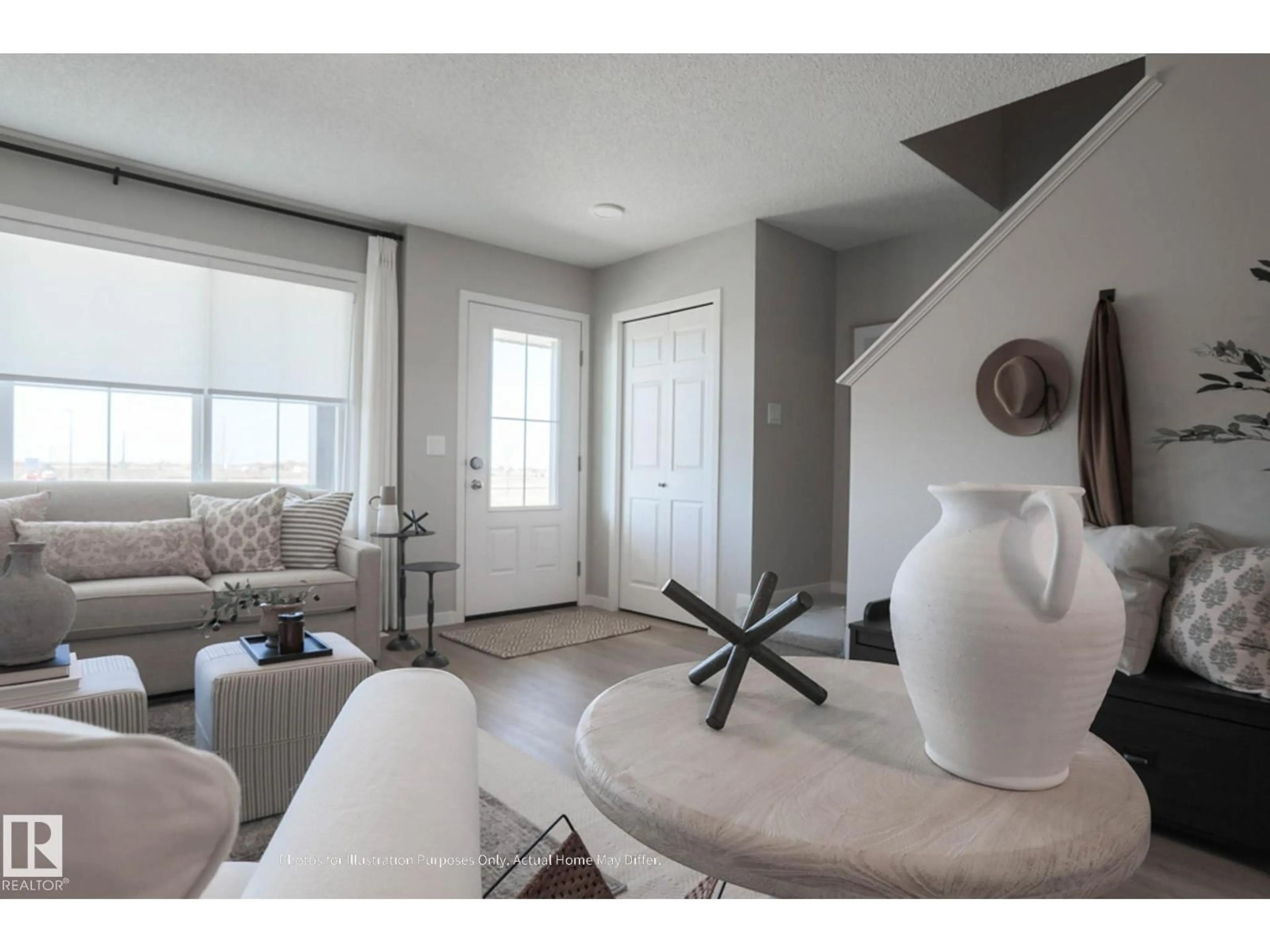 Living room with furniture, unknown for NW - 18928 28 AV, Edmonton Alberta T6M3H9