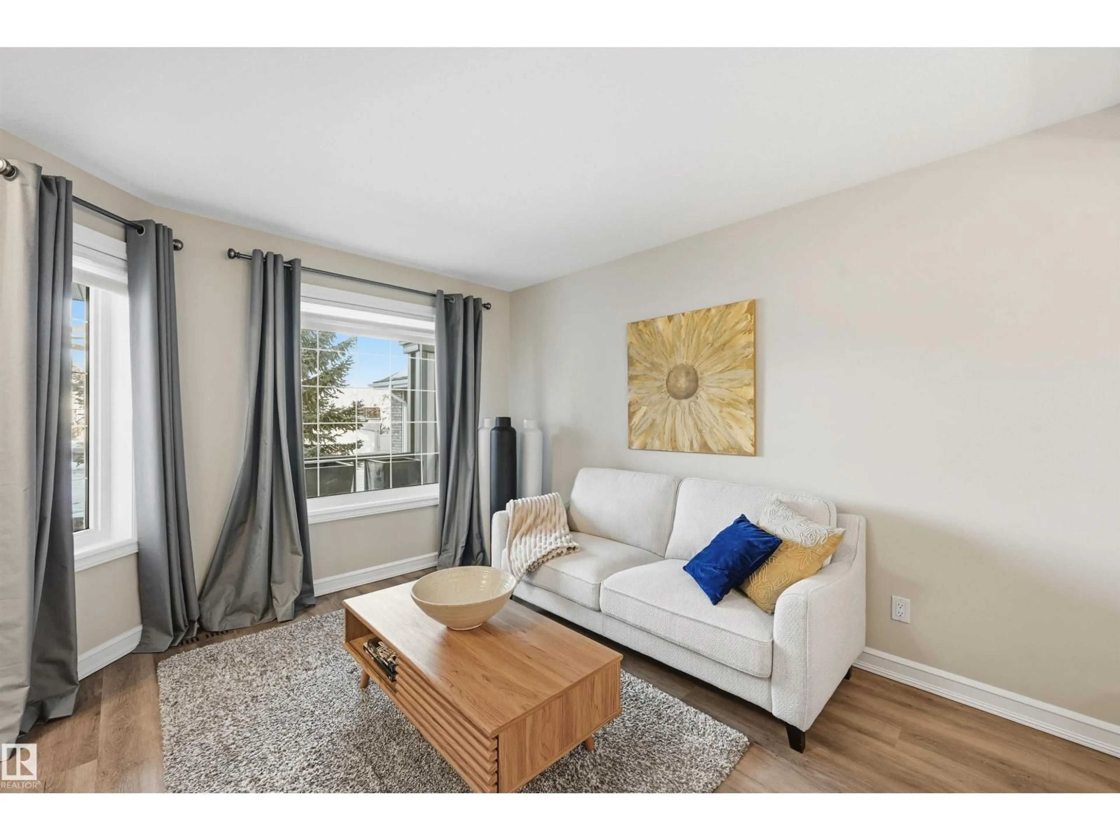 Living room with furniture, wood/laminate floor for 231 LINDSAY CR, Edmonton Alberta T6R2T2