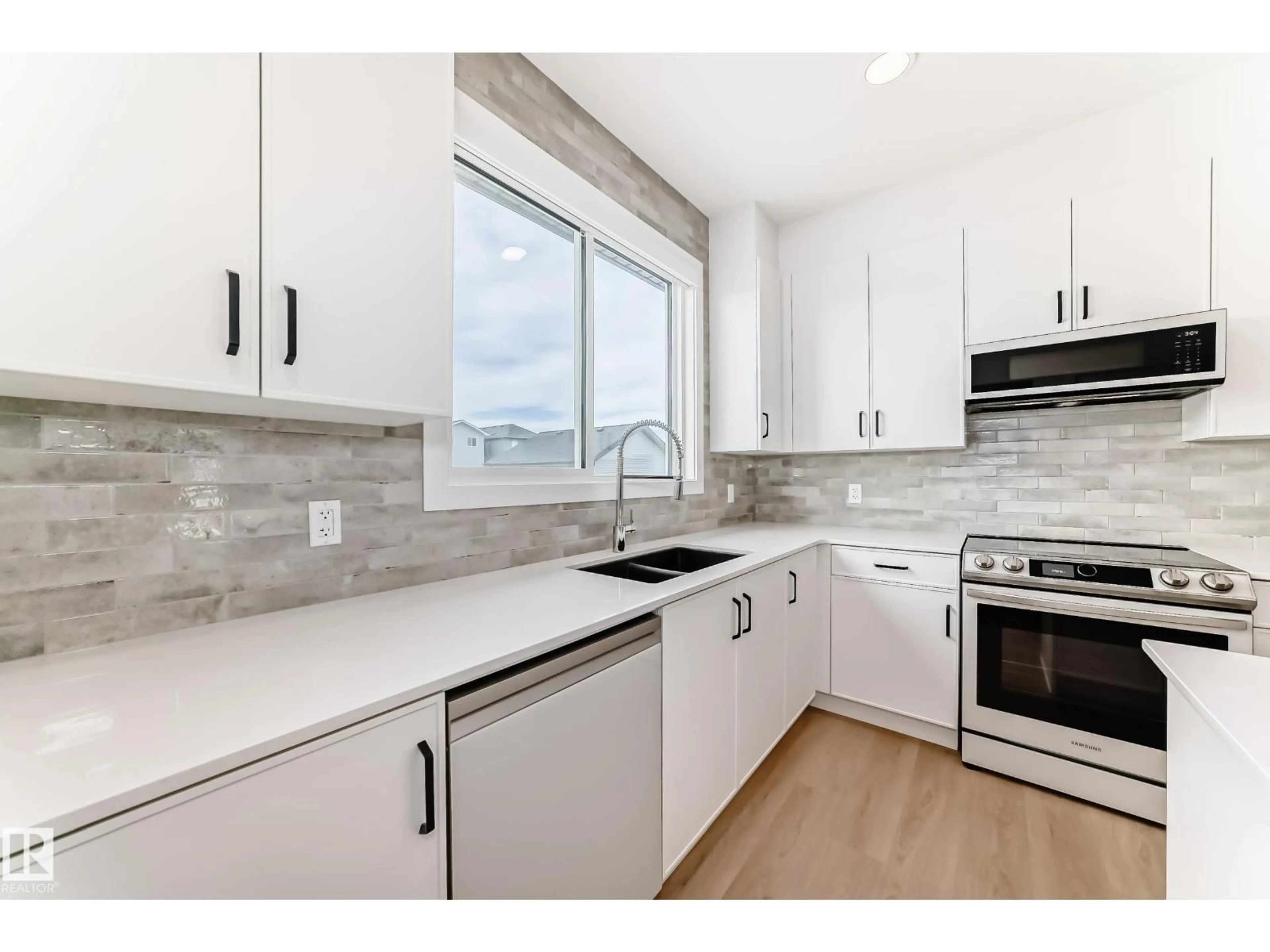 Open concept kitchen, ceramic/tile floor for SW - 2332 159 ST, Edmonton Alberta T6W5K5