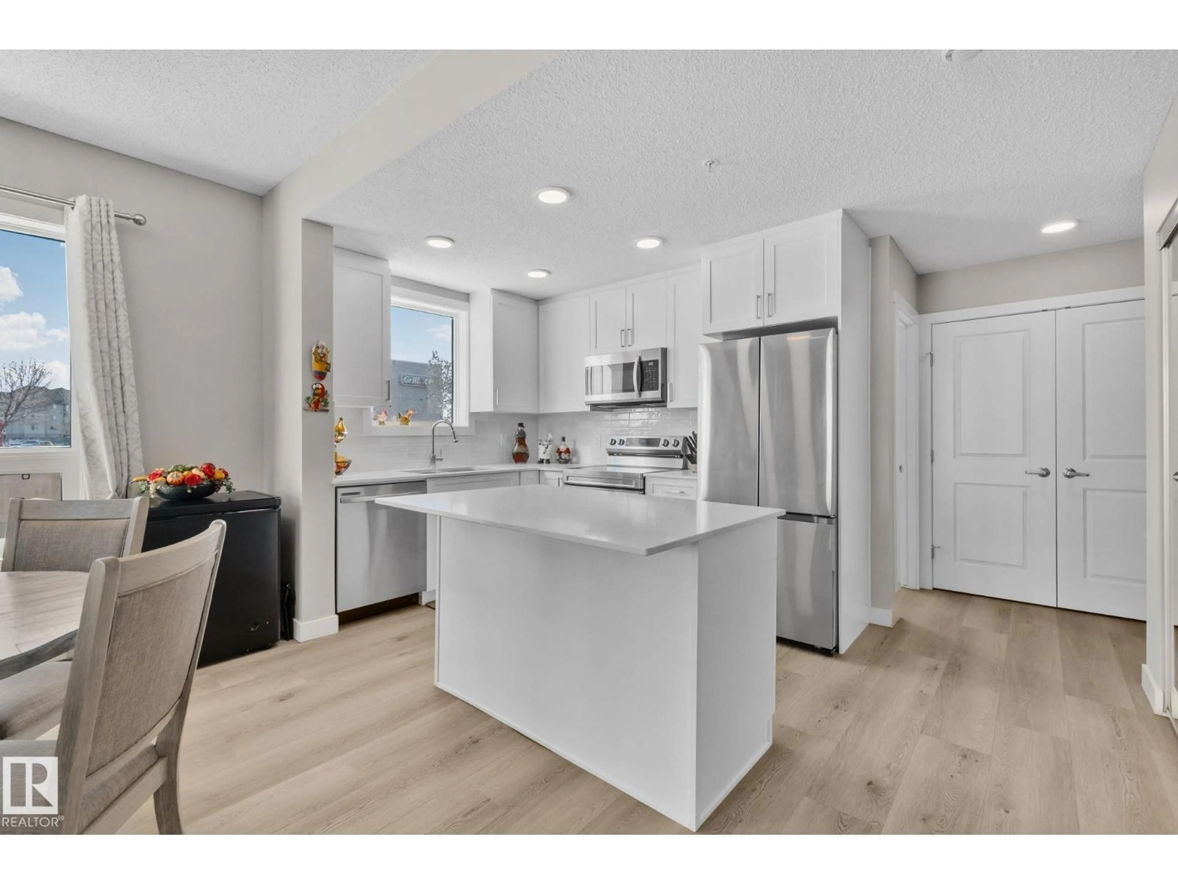 Open concept kitchen, unknown for 128 - 12804 140 AV, Edmonton Alberta T6V0M3