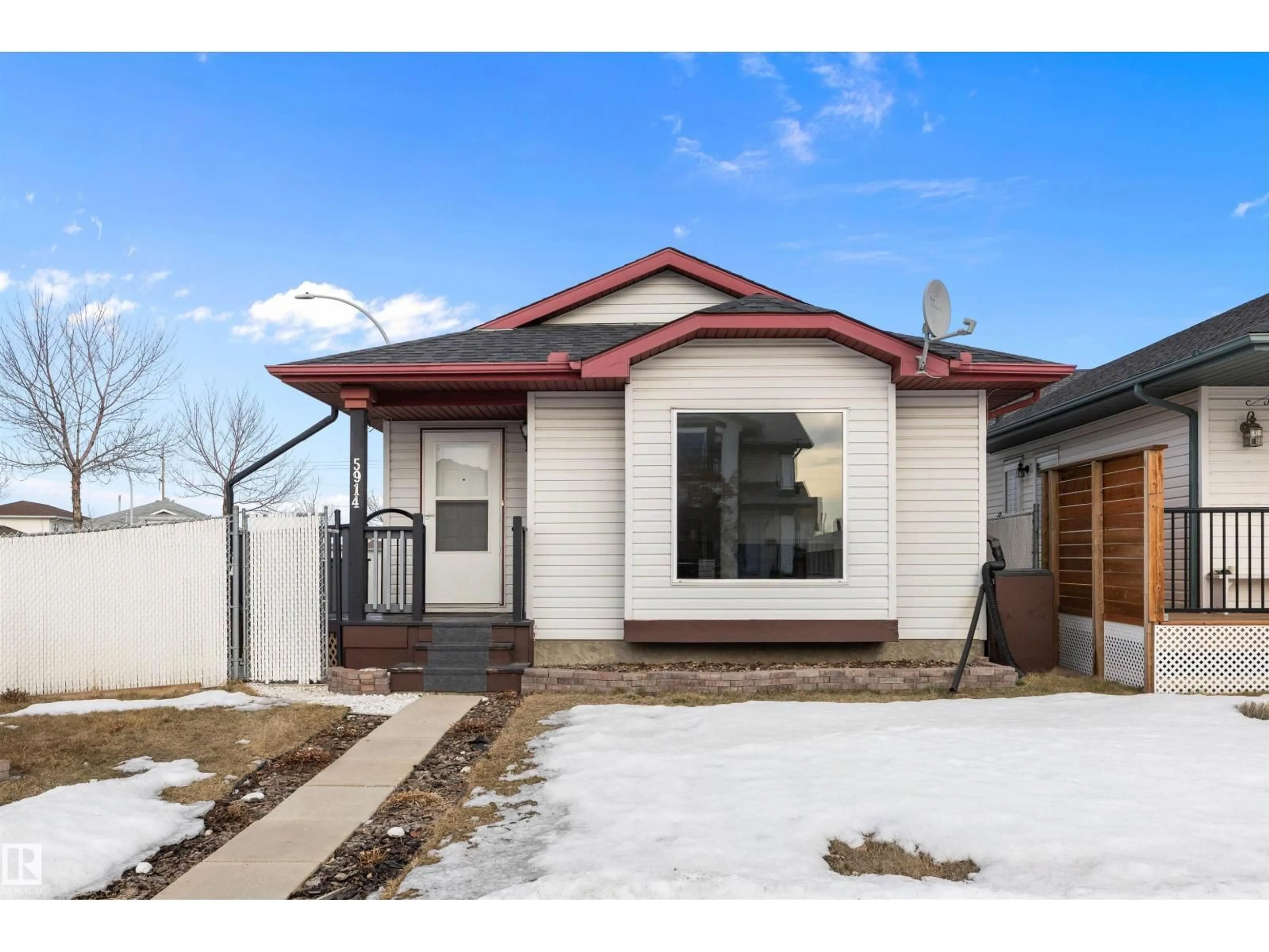 Home with vinyl exterior material, street for 5914 162A AV, Edmonton Alberta T5Y2W2