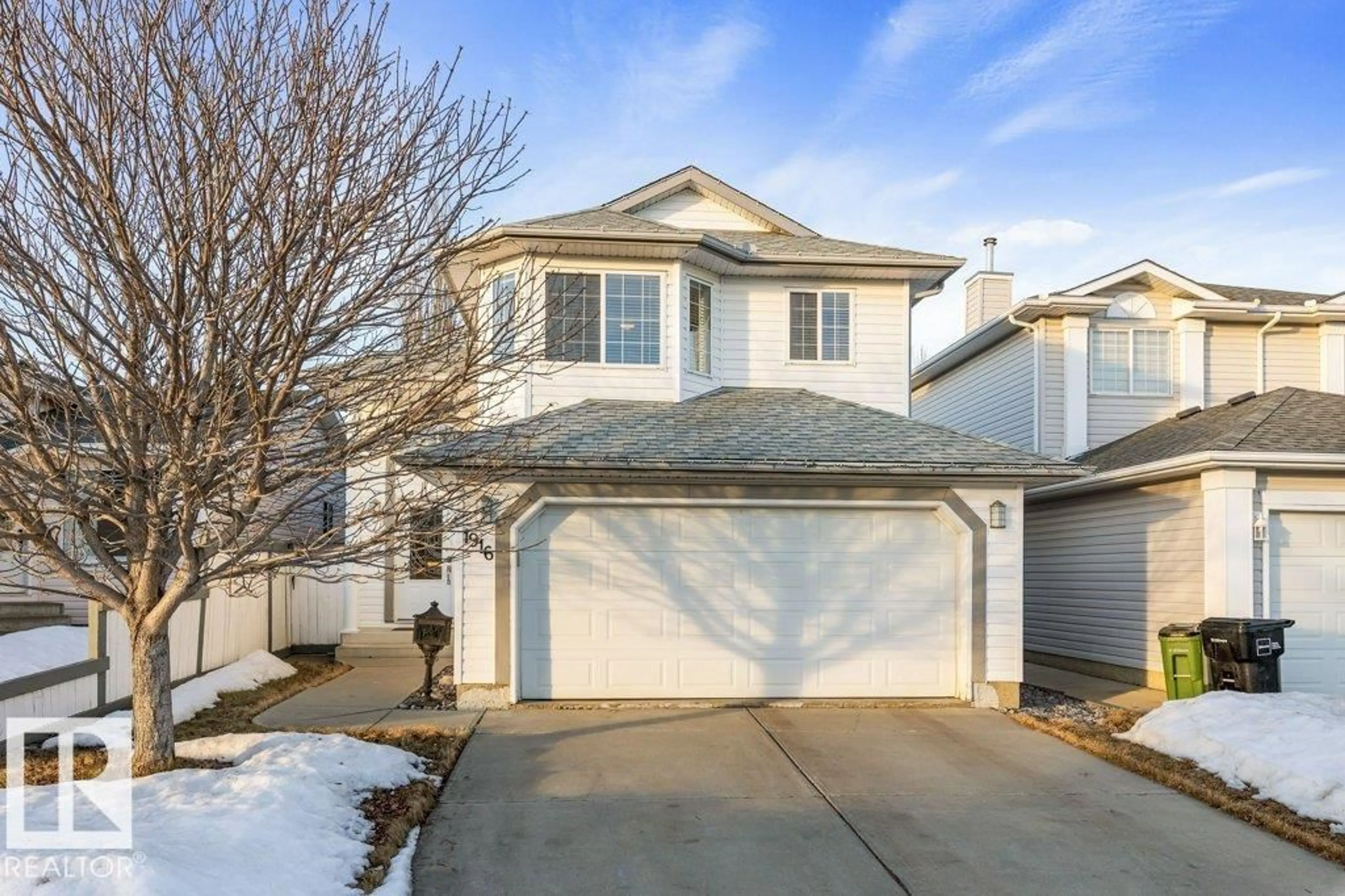 Home with vinyl exterior material, street for 1916 KRAMER WY, Edmonton Alberta T6L6Z7