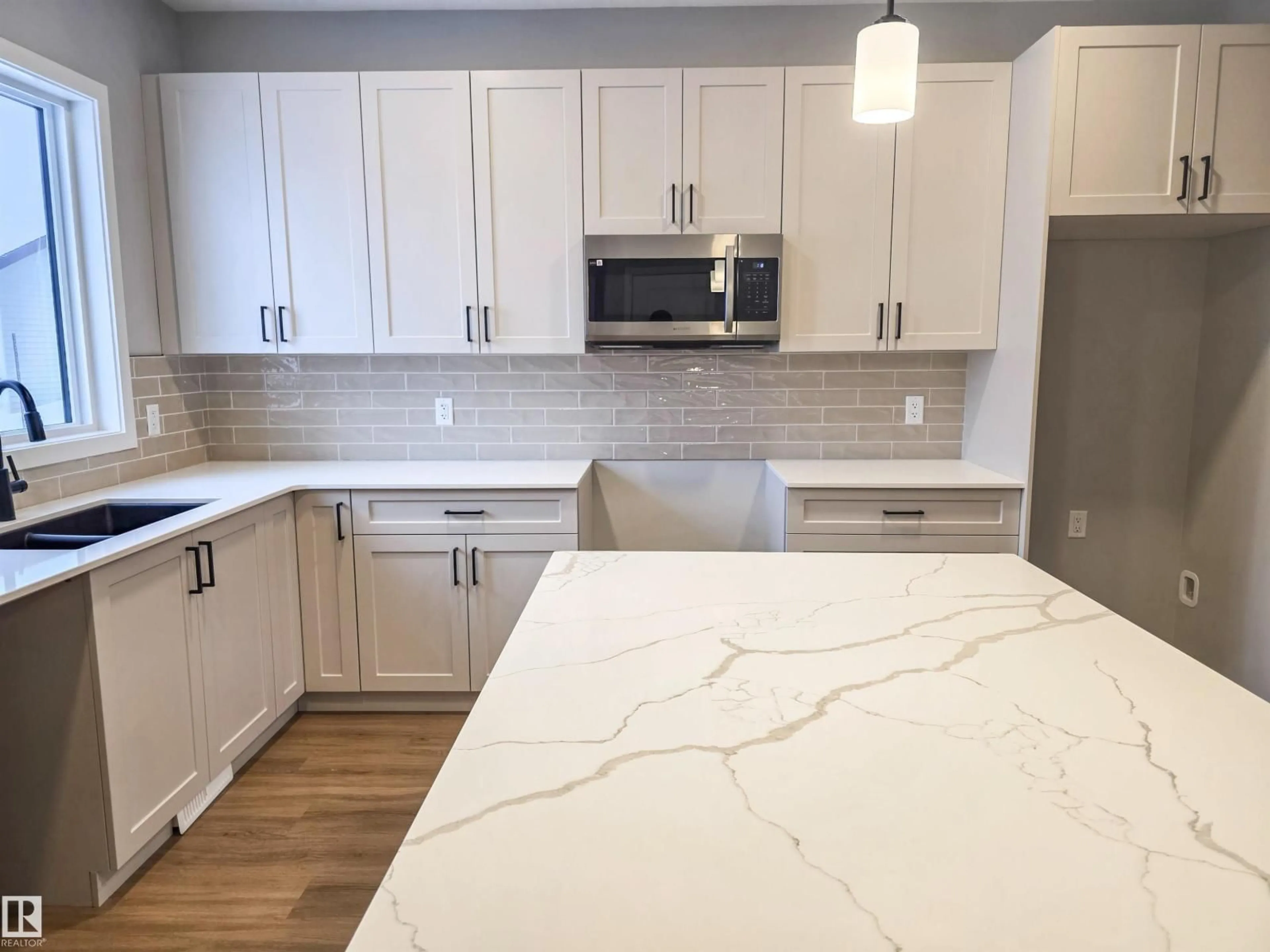 Open concept kitchen, ceramic/tile floor for 111 BRICKYARD DR, Stony Plain Alberta T7Z0P2