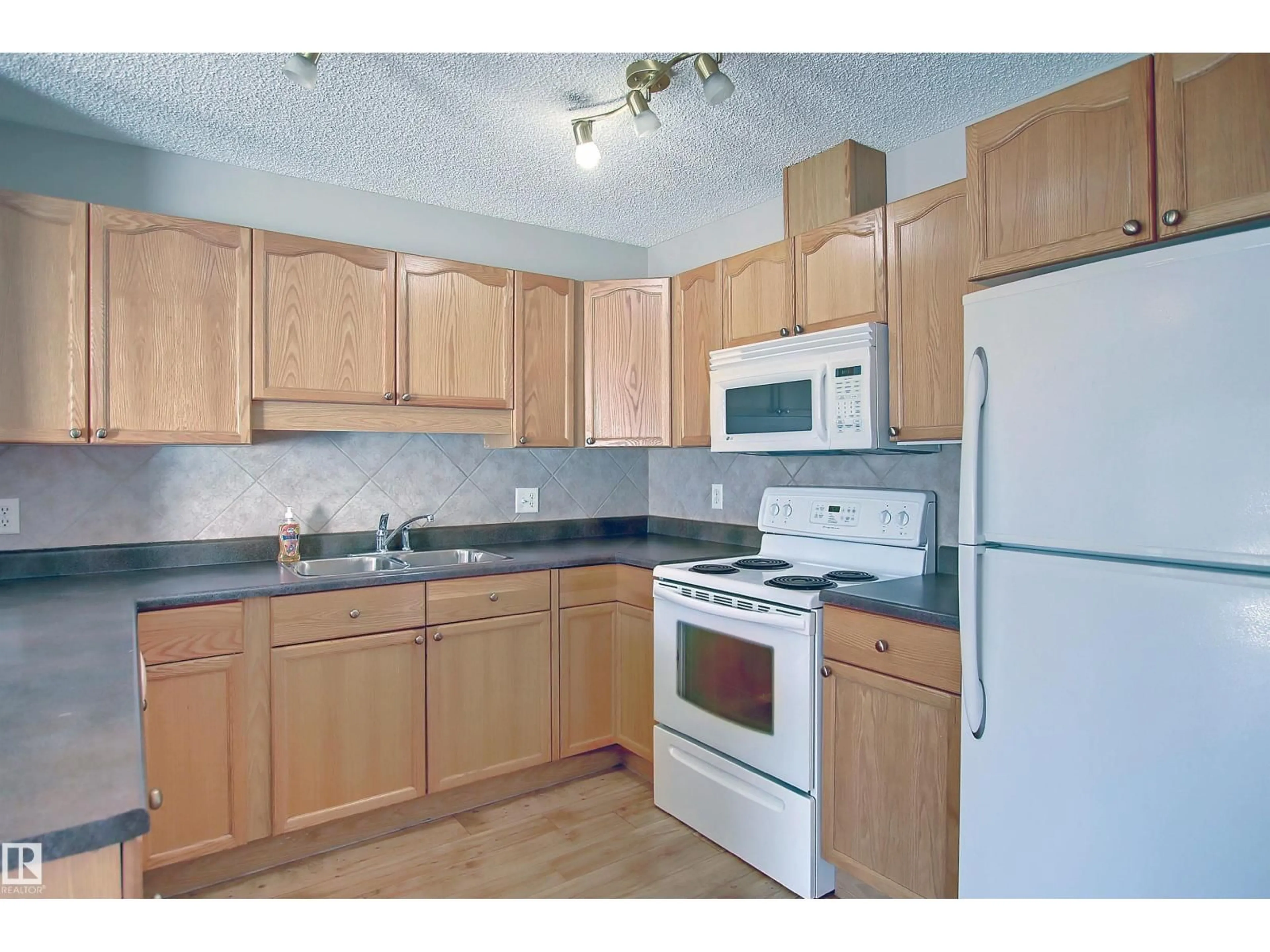 Standard kitchen, unknown for 8129 7 AV, Edmonton Alberta T6X1L9