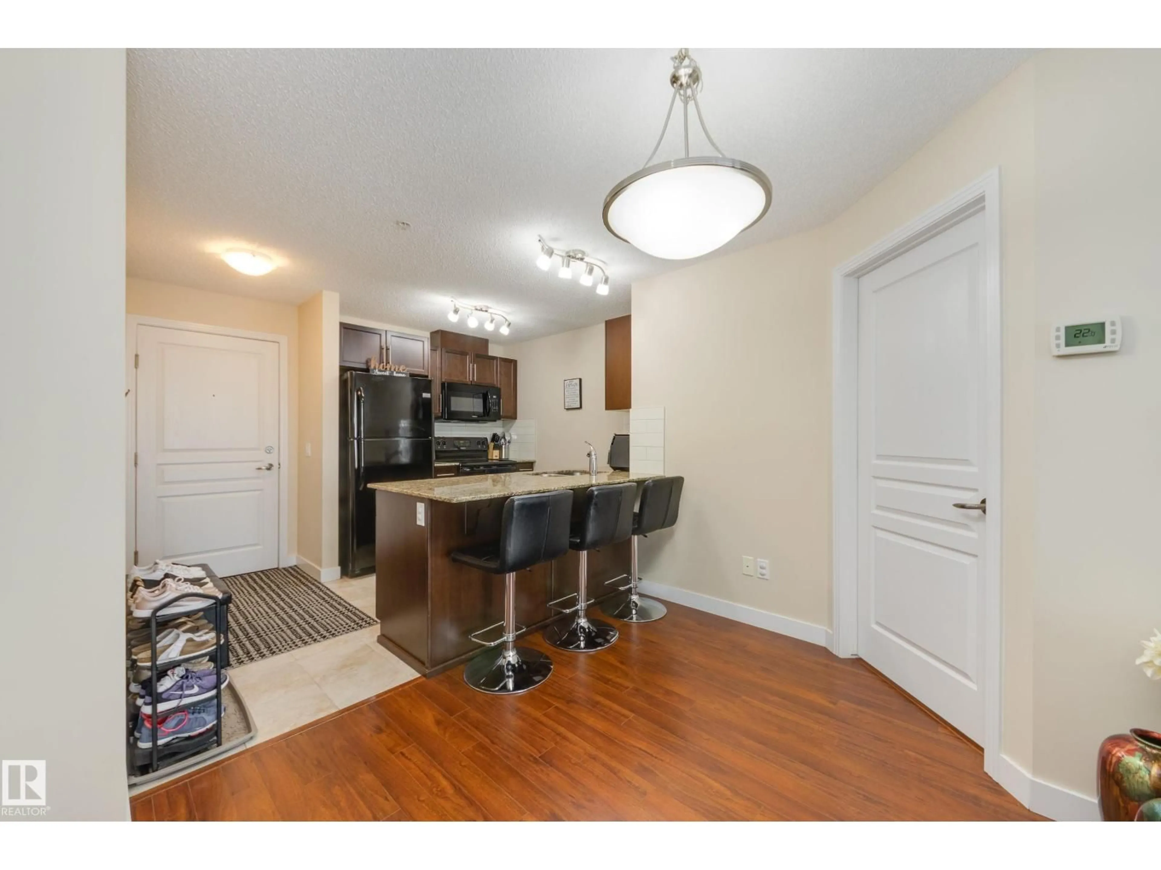 Open concept kitchen, wood/laminate floor for # - 2216 AUGUSTINE CR, Sherwood Park Alberta T8H0X8