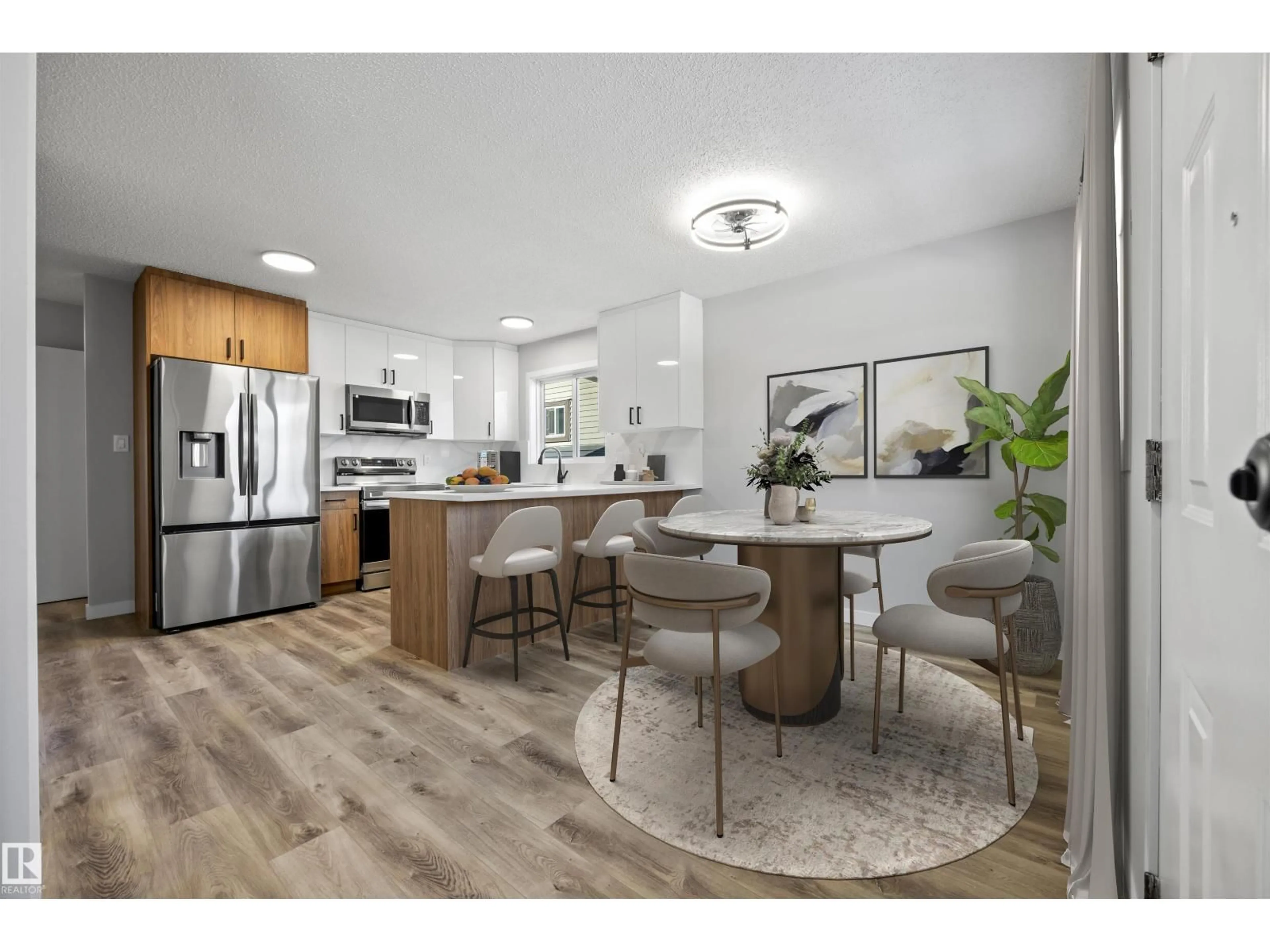 Open concept kitchen, wood/laminate floor for NW - 16924 95 ST, Edmonton Alberta T5T1Z1