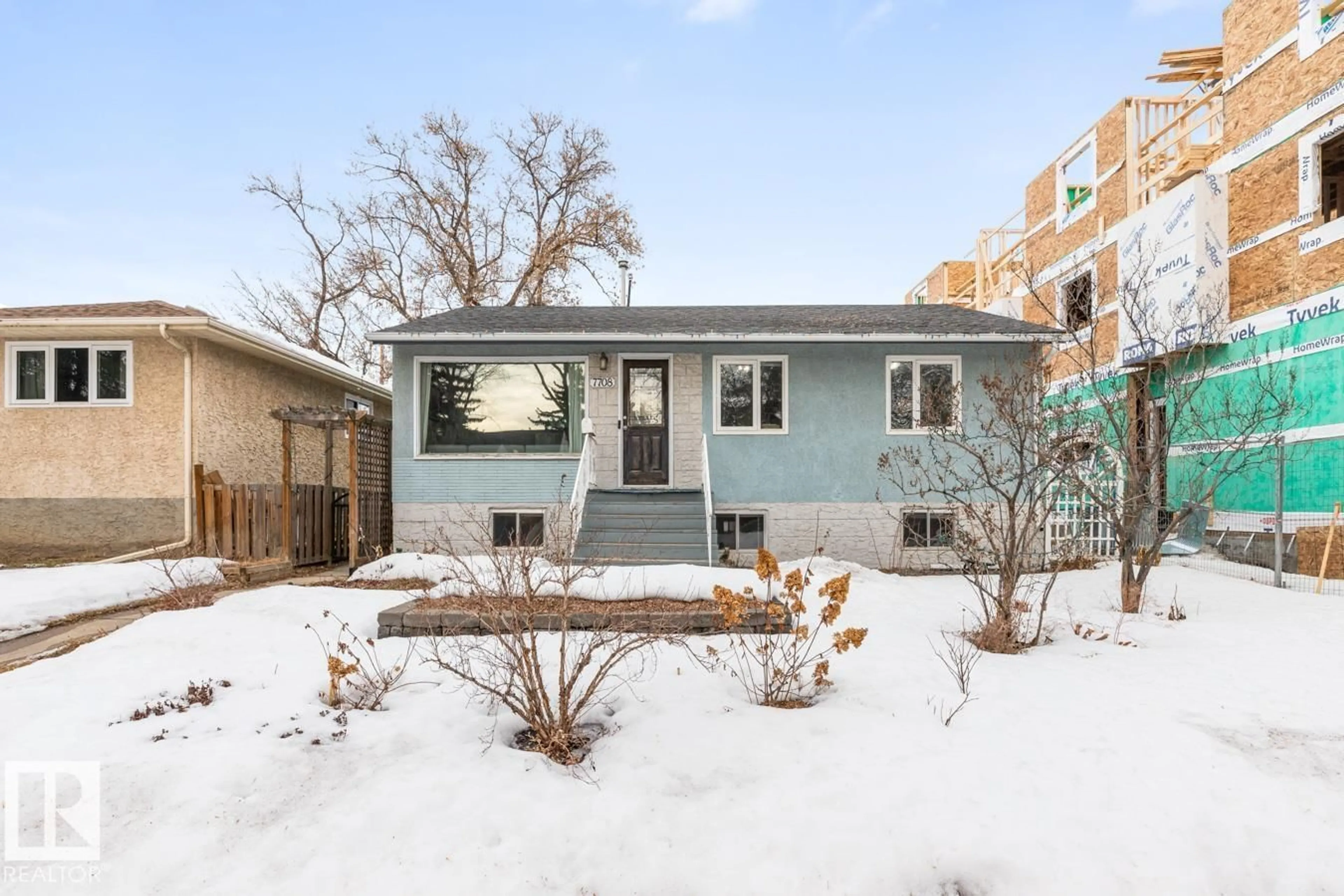 Home with vinyl exterior material, street for 7708 78 AV, Edmonton Alberta T6C0M9