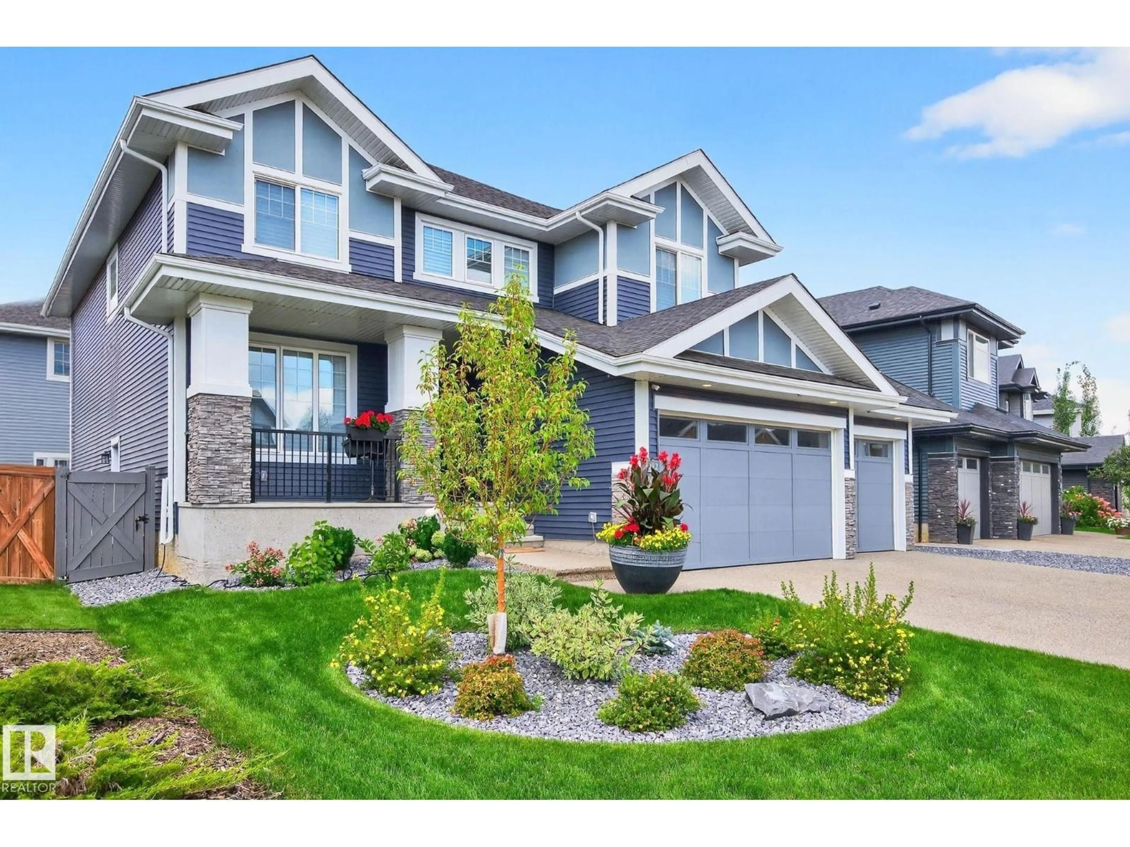 Home with vinyl exterior material, street for 3912 GINSBURG CR, Edmonton Alberta T5T4V1