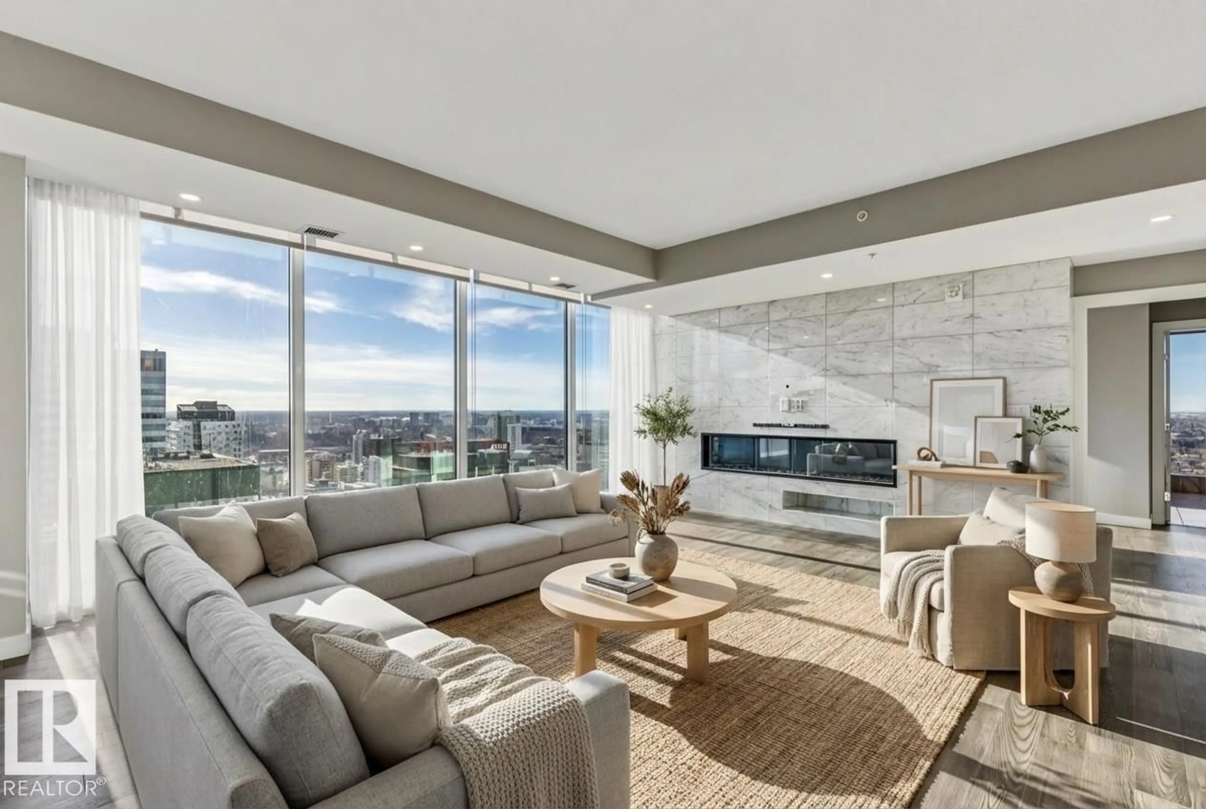 Living room with furniture, unknown for 3300 10180 103 ST NW, Edmonton Alberta T5J0L1