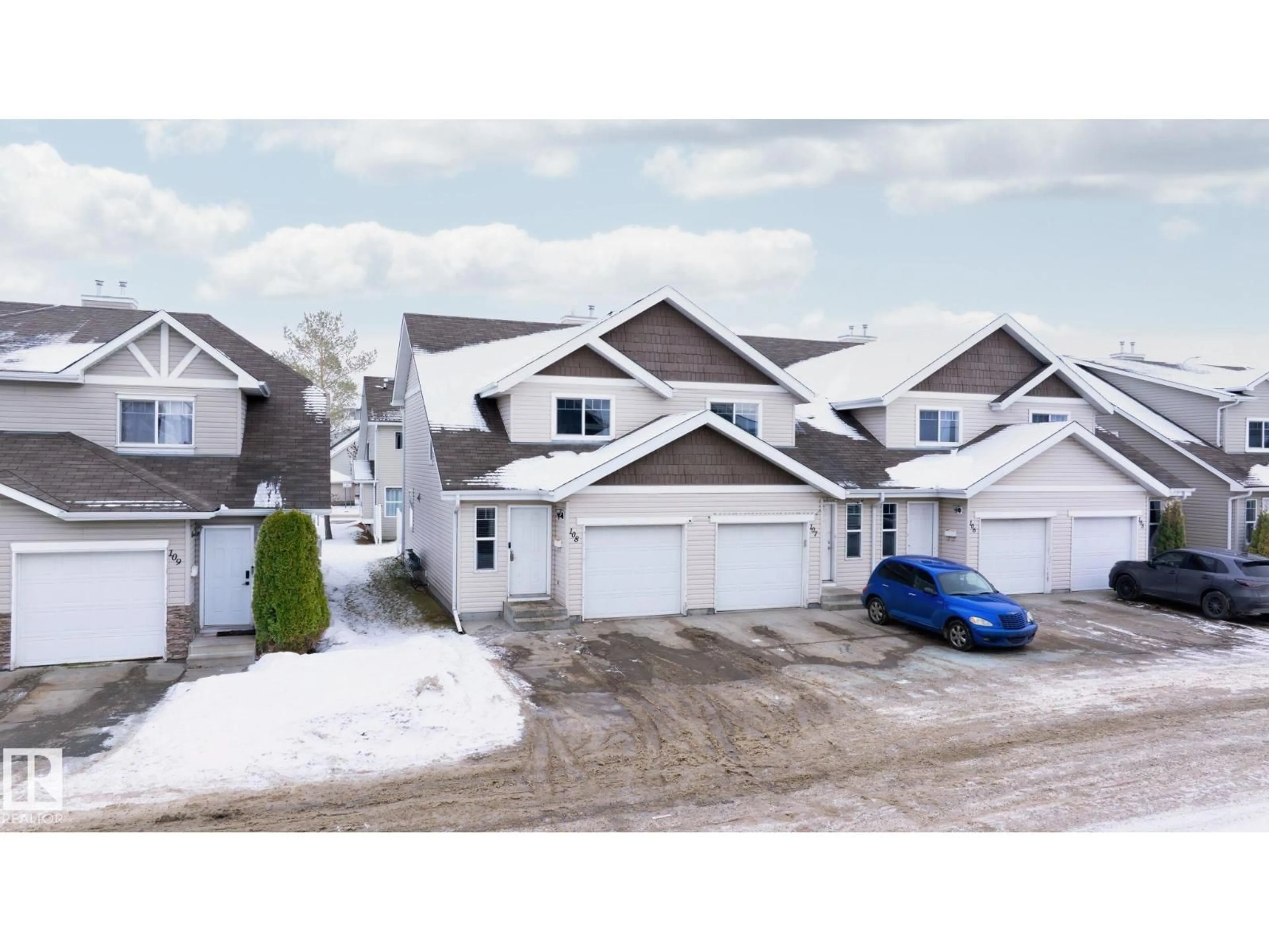 A pic from outside/outdoor area/front of a property/back of a property/a pic from drone, street for #108 - 150 EDWARDS DR, Edmonton Alberta T6M1M4