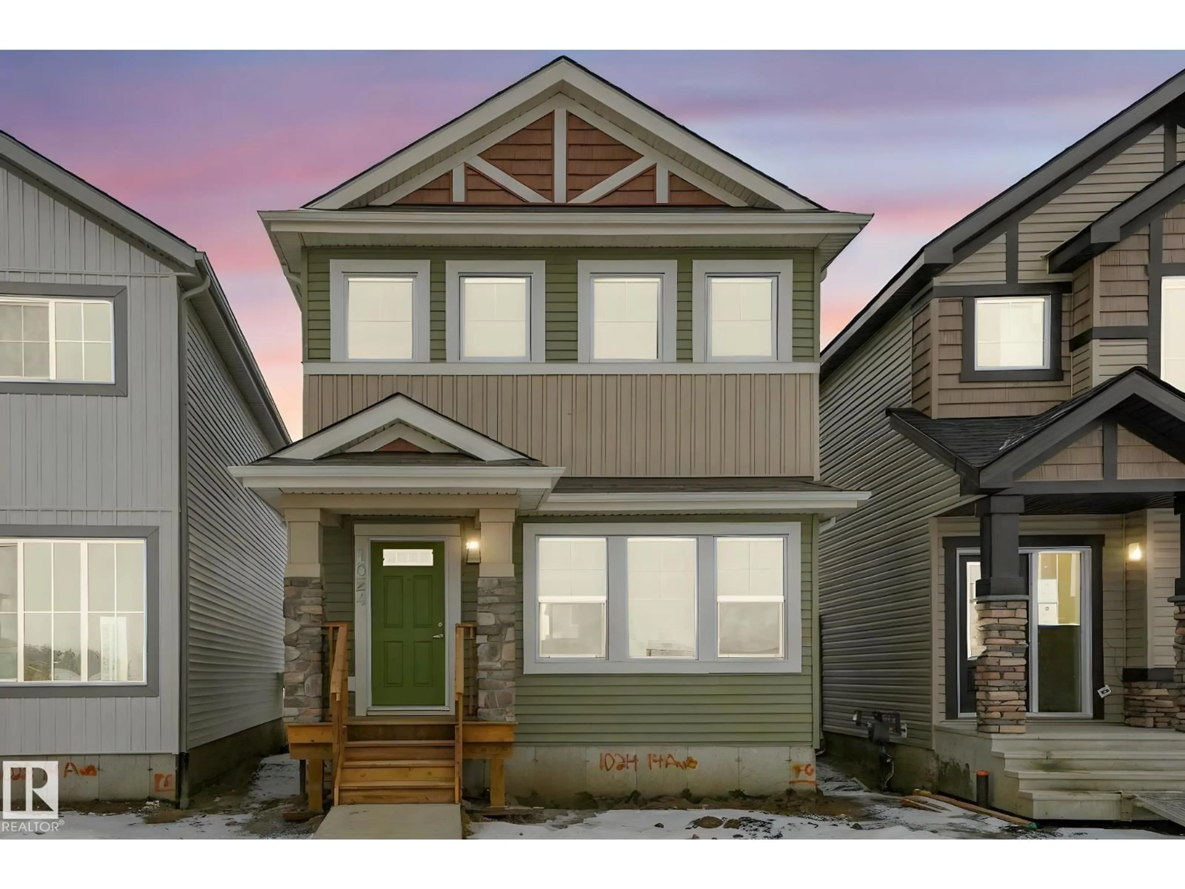 Home with vinyl exterior material, street for 1024 14 AVENUE NW, Edmonton Alberta T6T2W8