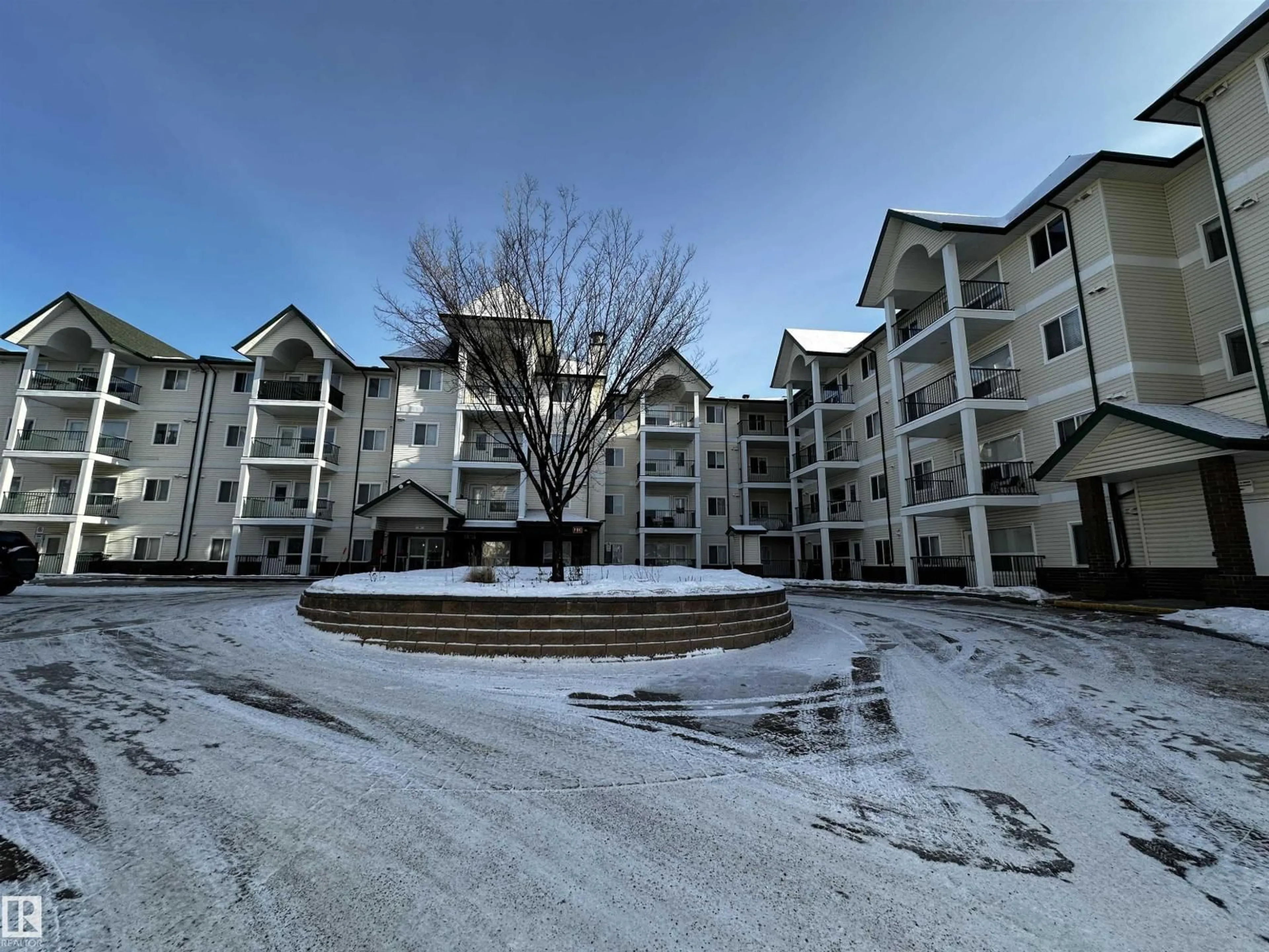 A pic from outside/outdoor area/front of a property/back of a property/a pic from drone, mountain view for #215 - 13625 34 ST, Edmonton Alberta T5A0E3