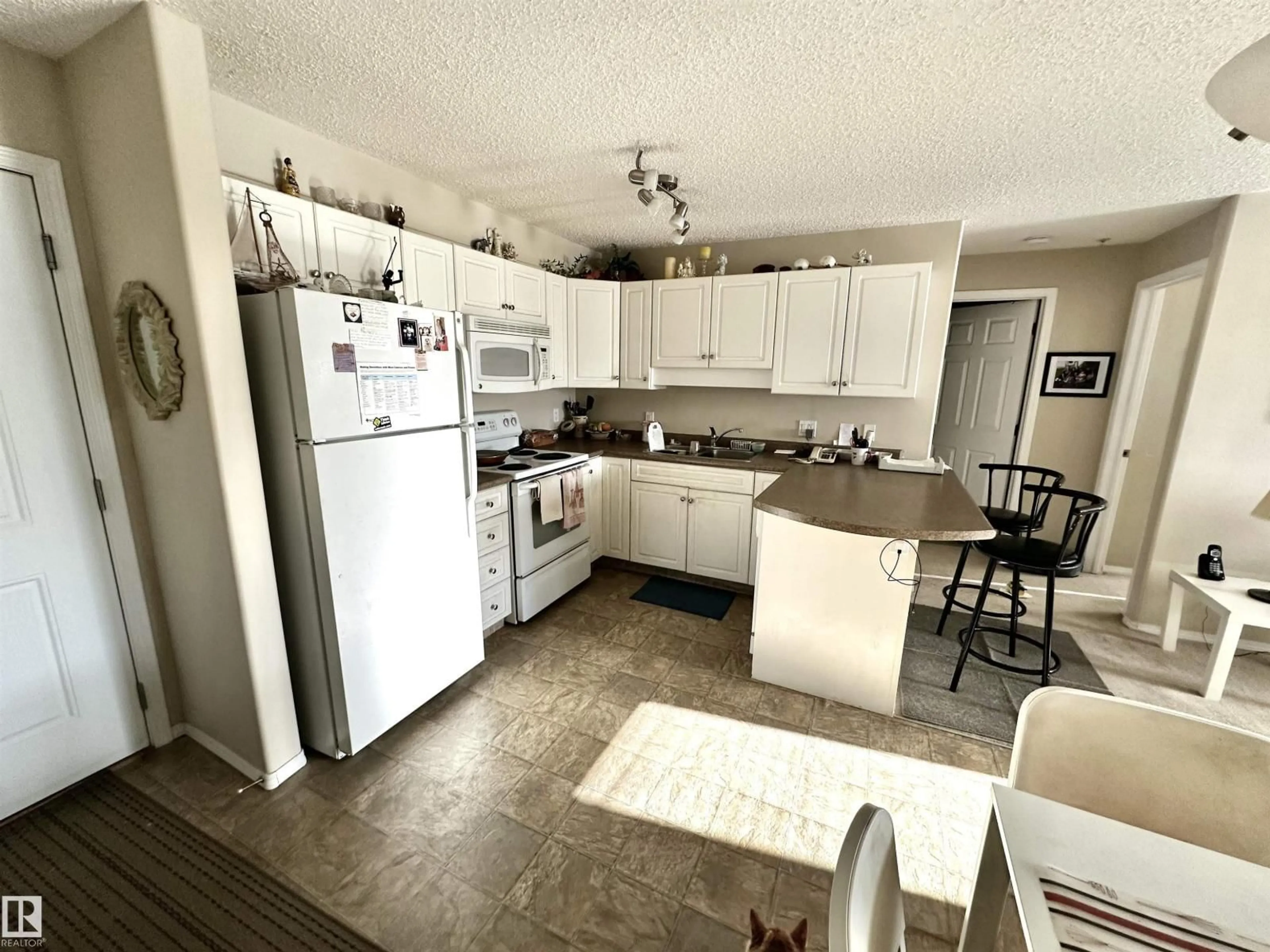 Open concept kitchen, unknown for #215 - 13625 34 ST, Edmonton Alberta T5A0E3