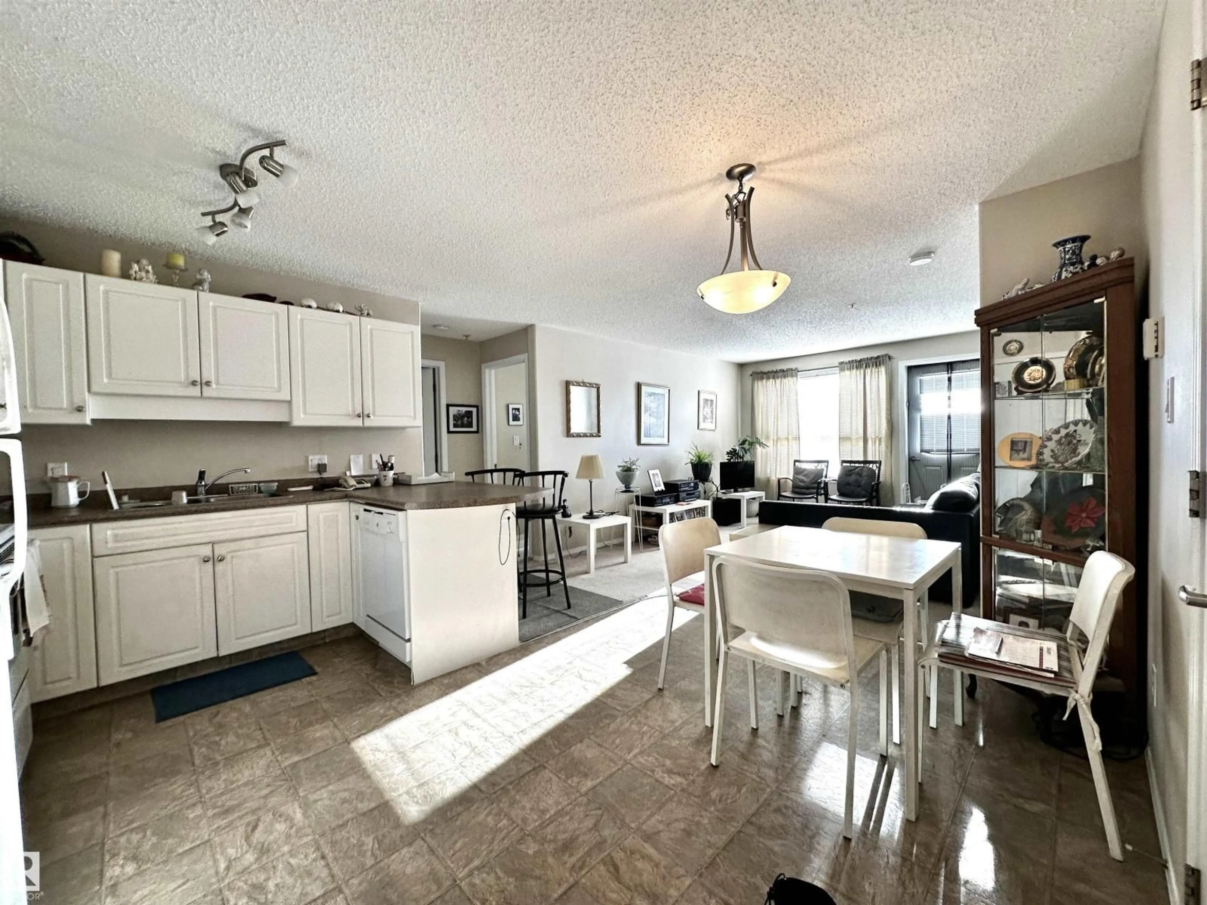 Open concept kitchen, ceramic/tile floor for #215 - 13625 34 ST, Edmonton Alberta T5A0E3