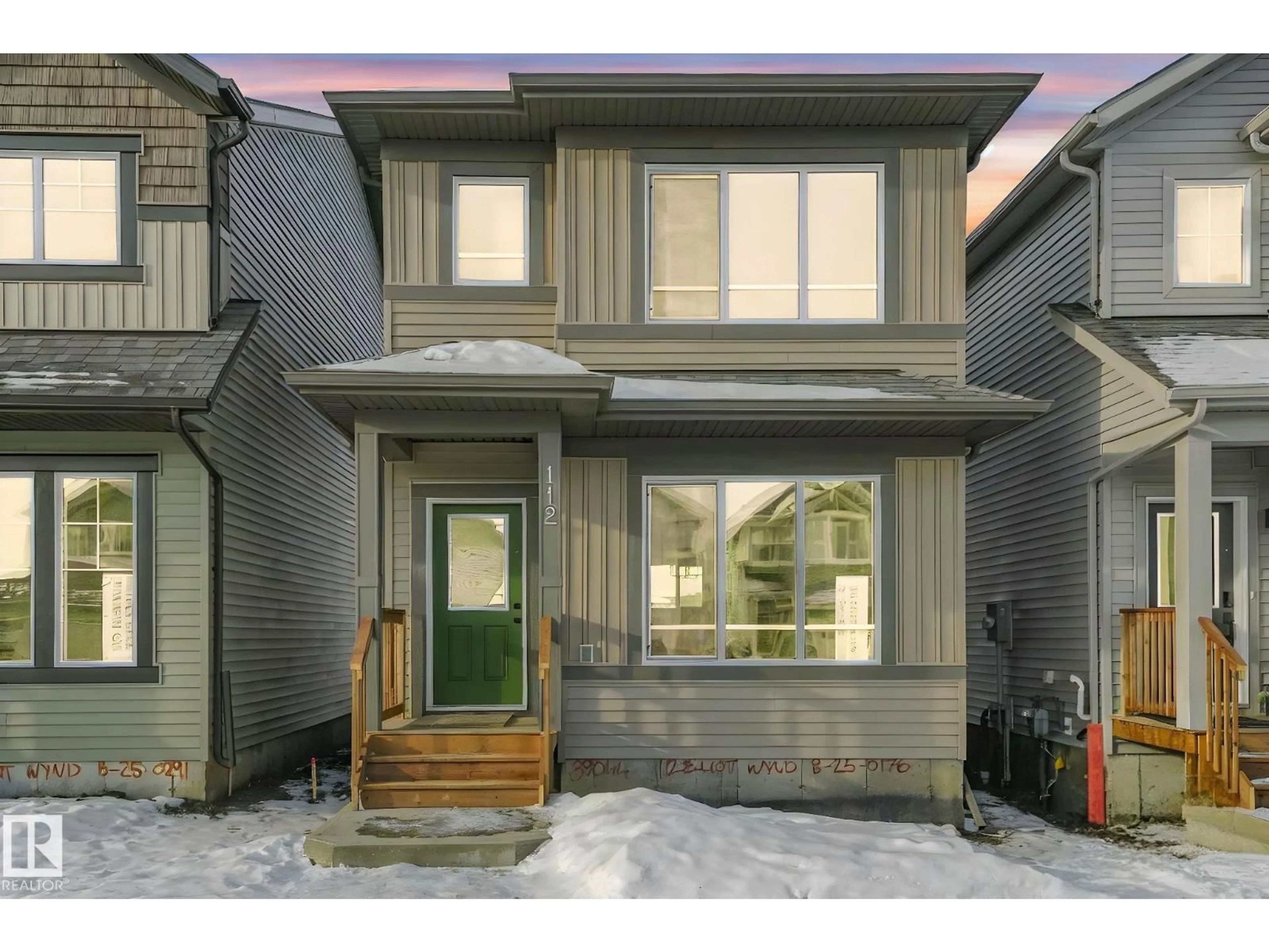 Home with vinyl exterior material, street for 112 ELLIOTT WD, Fort Saskatchewan Alberta T8L1R8