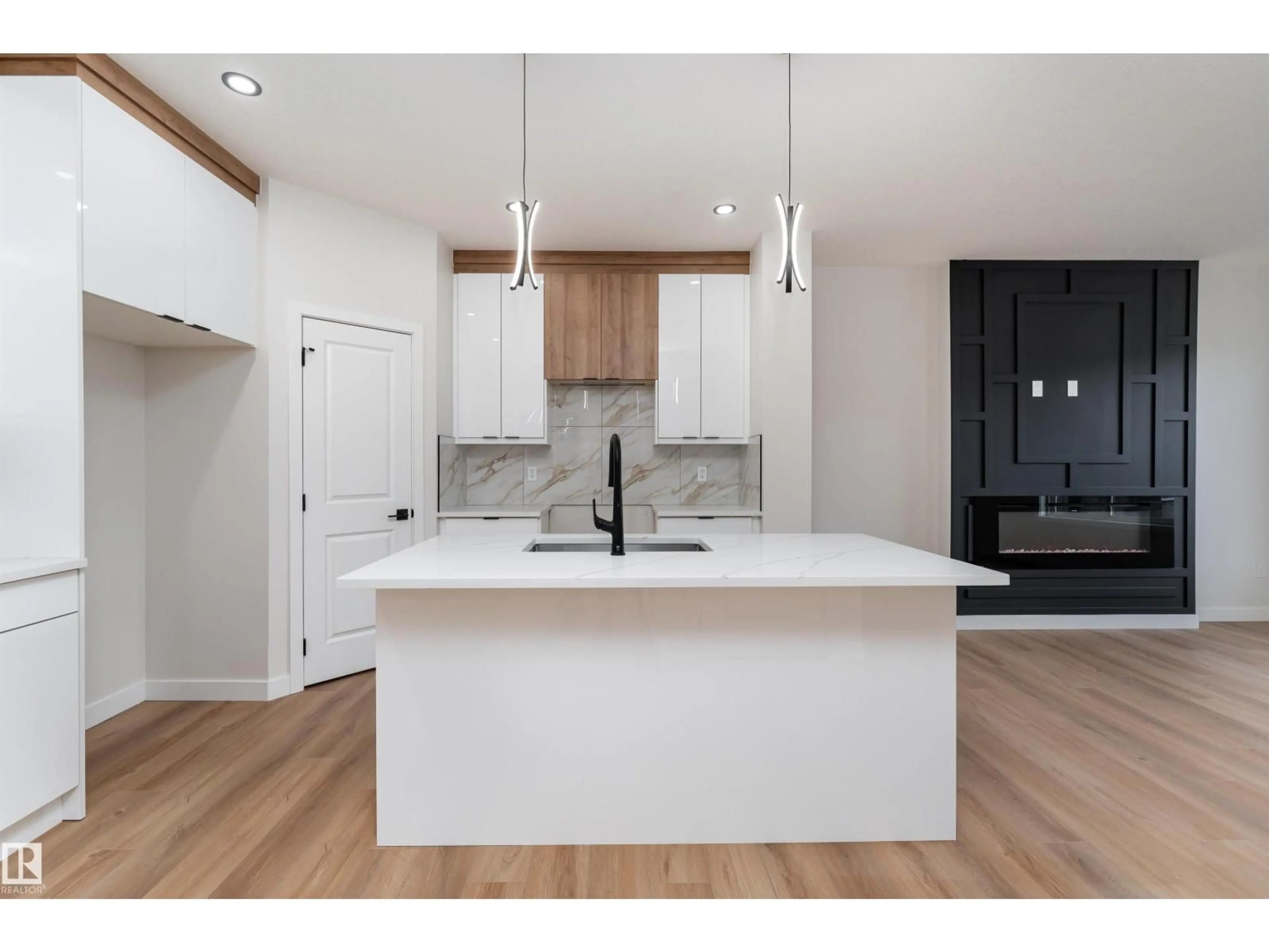 Open concept kitchen, wood/laminate floor for 30 WESTWYCK LI, Spruce Grove Alberta T7X3H1