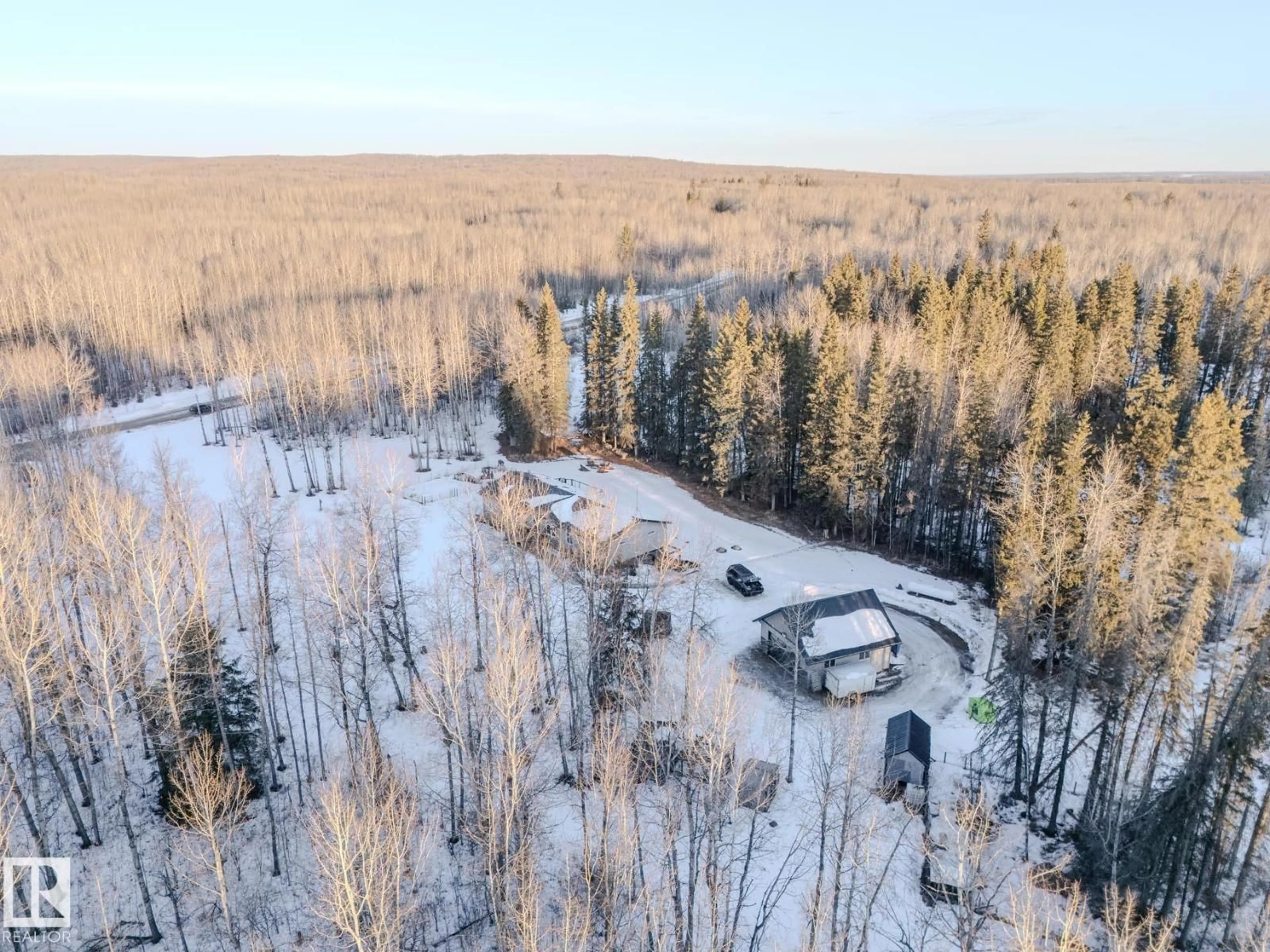A pic from outside/outdoor area/front of a property/back of a property/a pic from drone, forest/trees view for 54501 RGE ROAD 62, Rural Lac Ste. Anne County Alberta T7X0O0