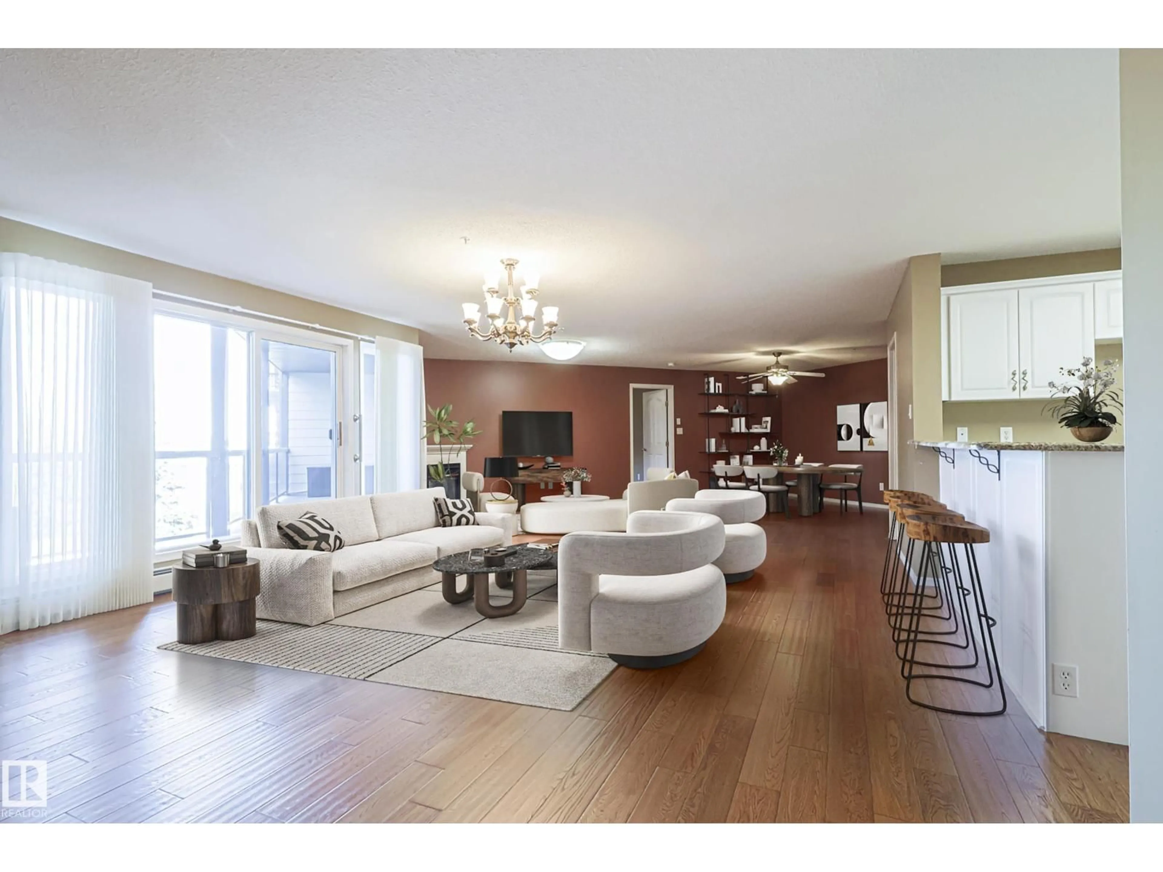 Living room with furniture, wood/laminate floor for 100 - 314 FOXHAVEN DR, Sherwood Park Alberta T8A6B6