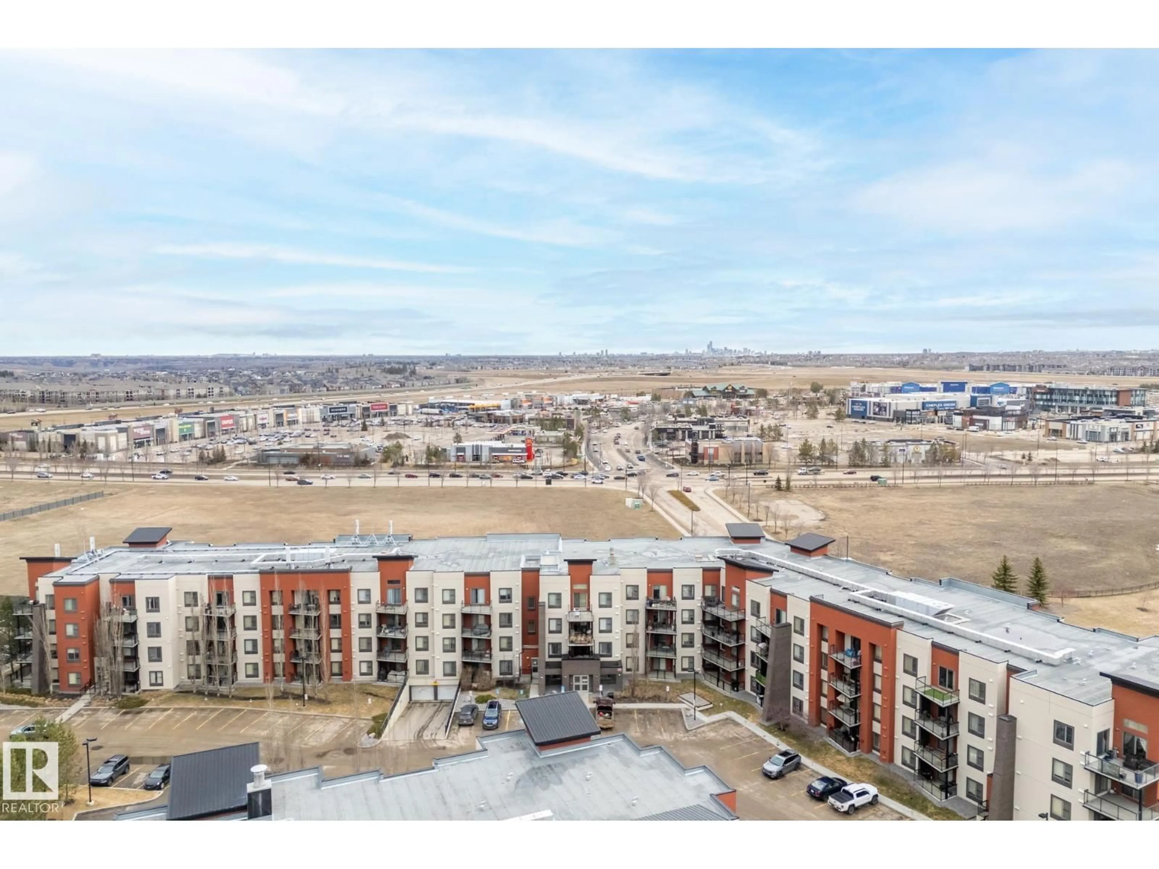 A pic from outside/outdoor area/front of a property/back of a property/a pic from drone, city buildings view from balcony for #224 - 304 AMBLESIDE LI, Edmonton Alberta T6W0V2