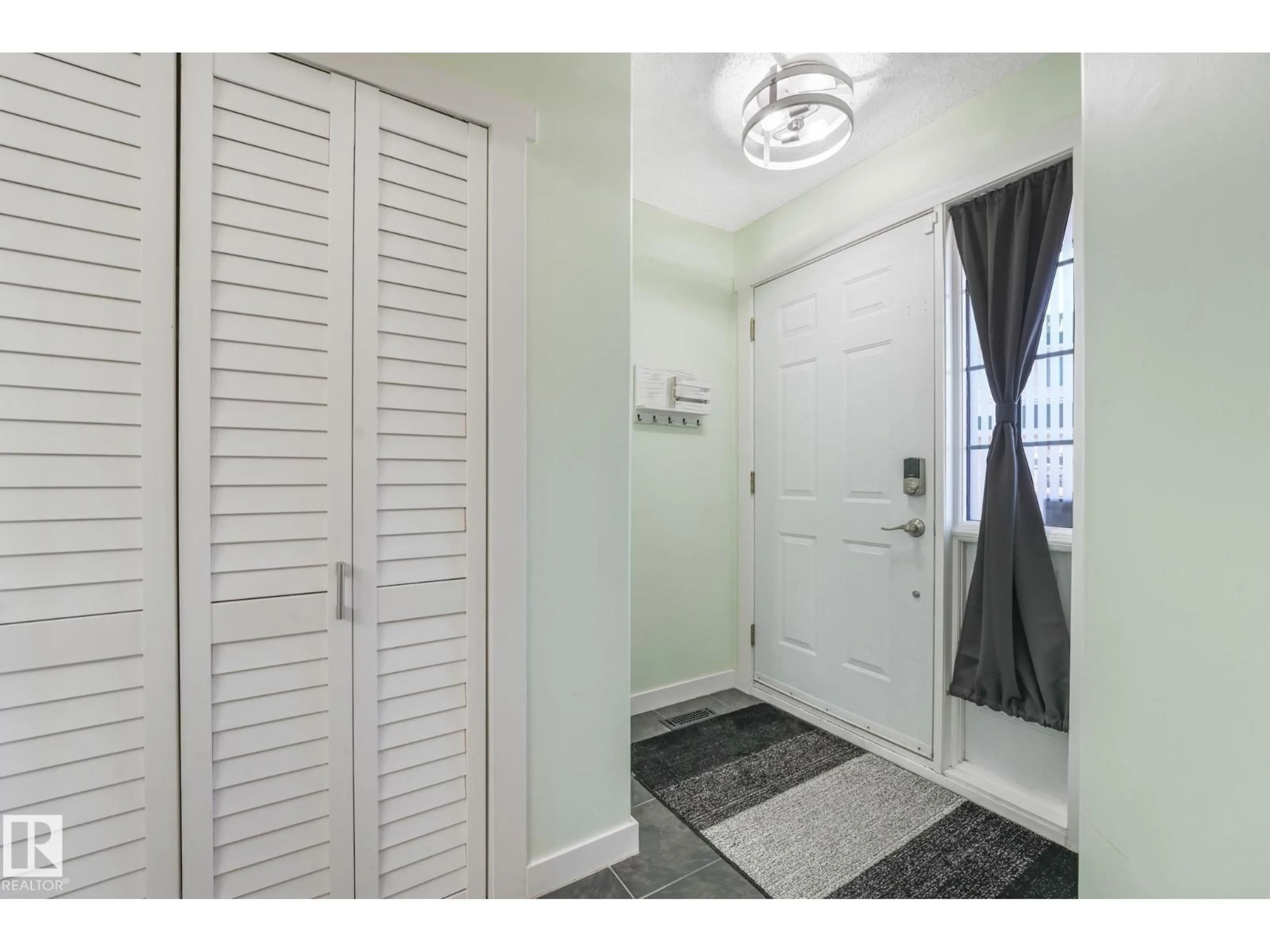 Indoor entryway for 24 - 2419 133 AV, Edmonton Alberta T5A5A5