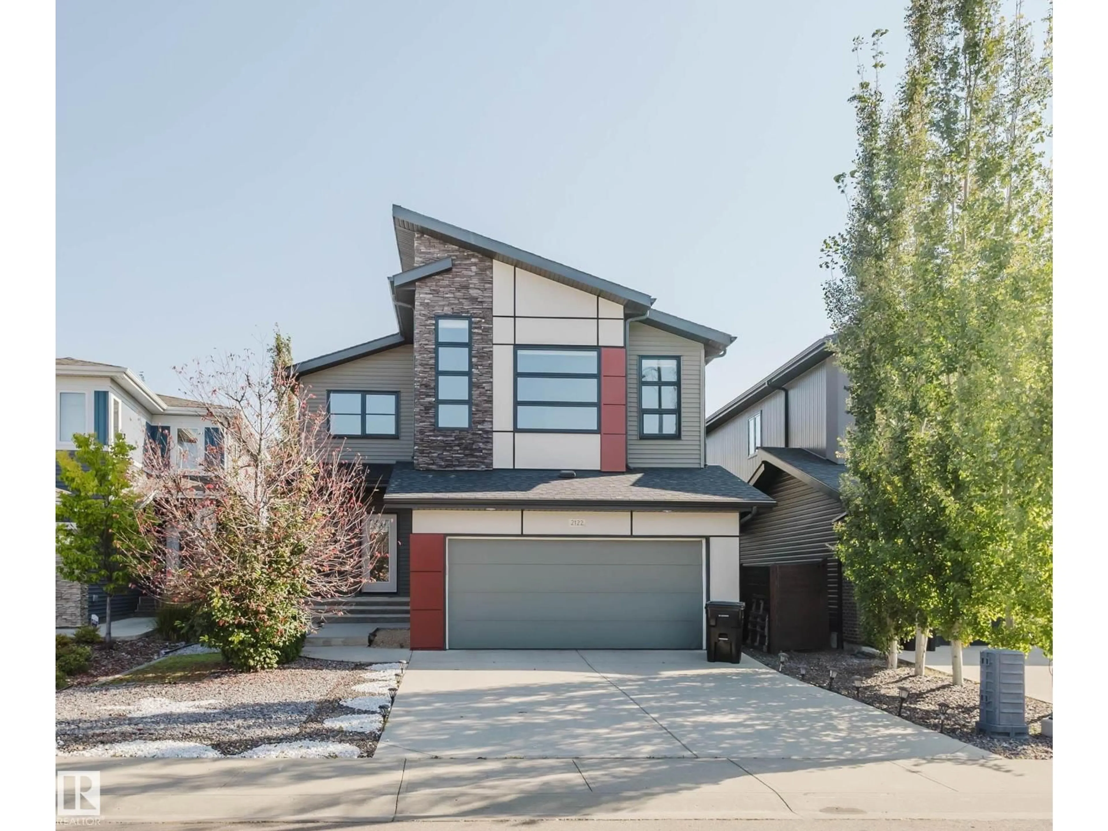 Home with brick exterior material, street for 2122 WARE RD, Edmonton Alberta T6W2T9