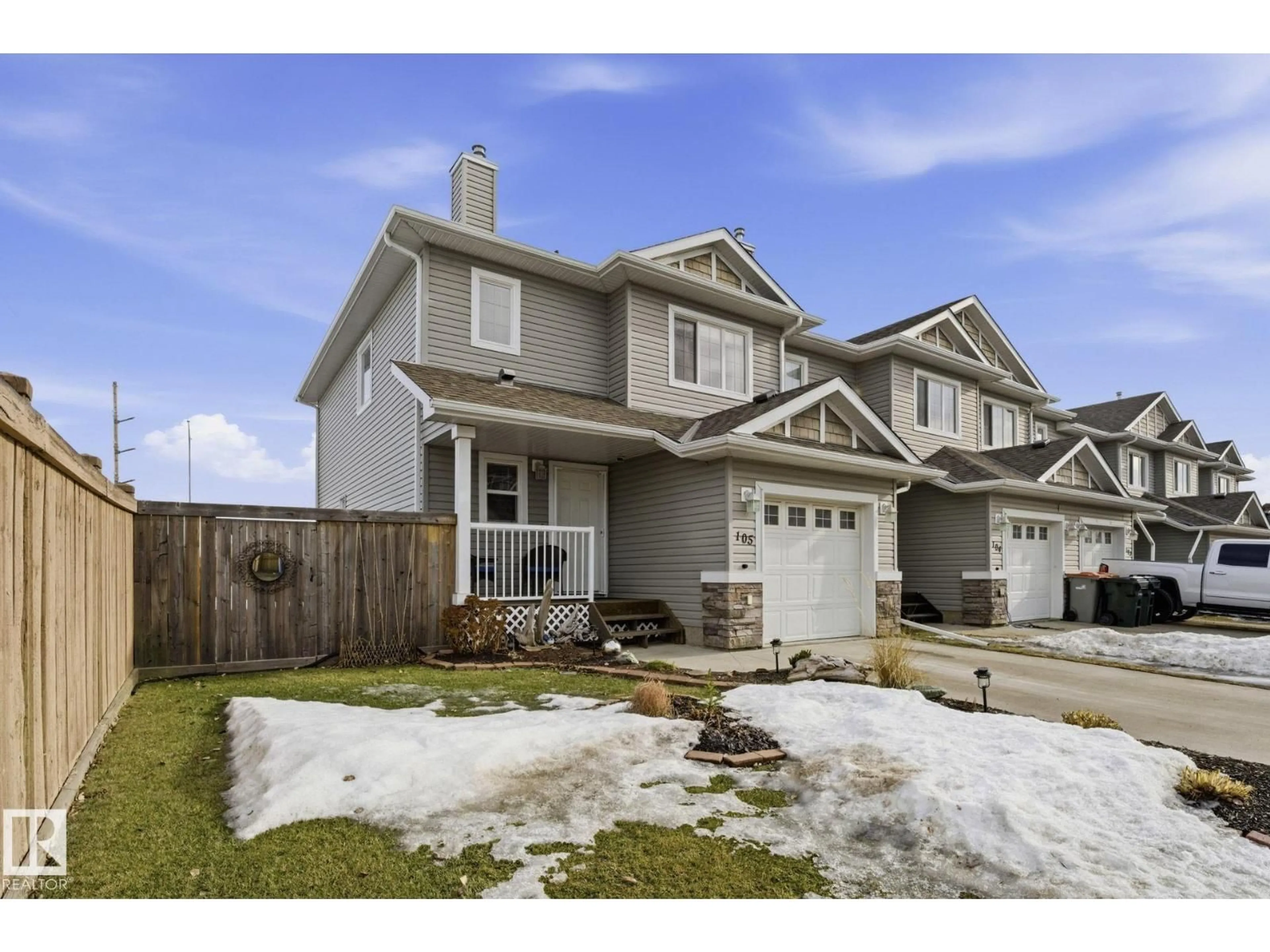 Home with vinyl exterior material, street for 105 GRAYWOOD ME, Stony Plain Alberta T7Z0C2