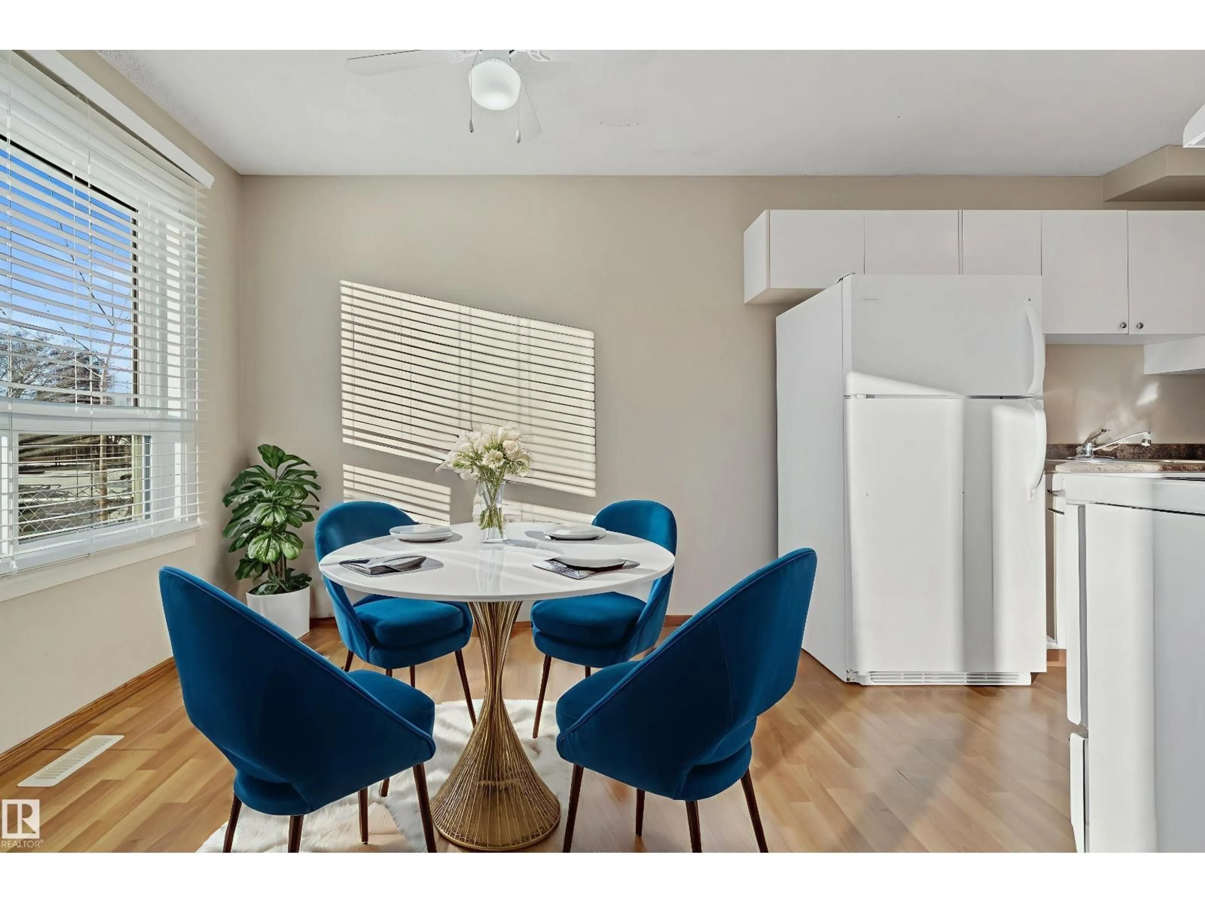 Dining room, wood/laminate floor for 2206 38 ST, Edmonton Alberta T6L4C3