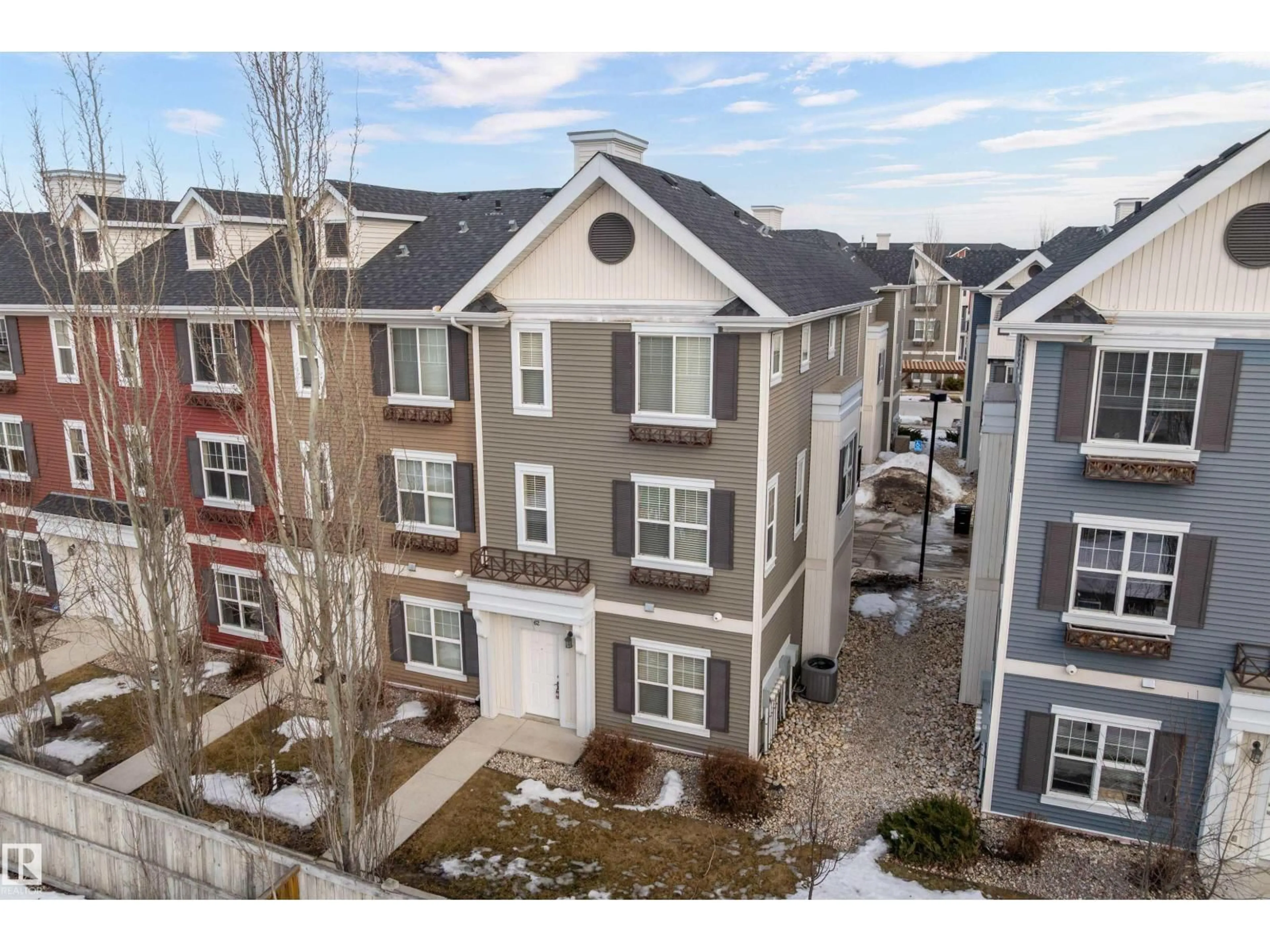 A pic from outside/outdoor area/front of a property/back of a property/a pic from drone, unknown for 62 8315 180 AV, Edmonton Alberta T5Z0J2