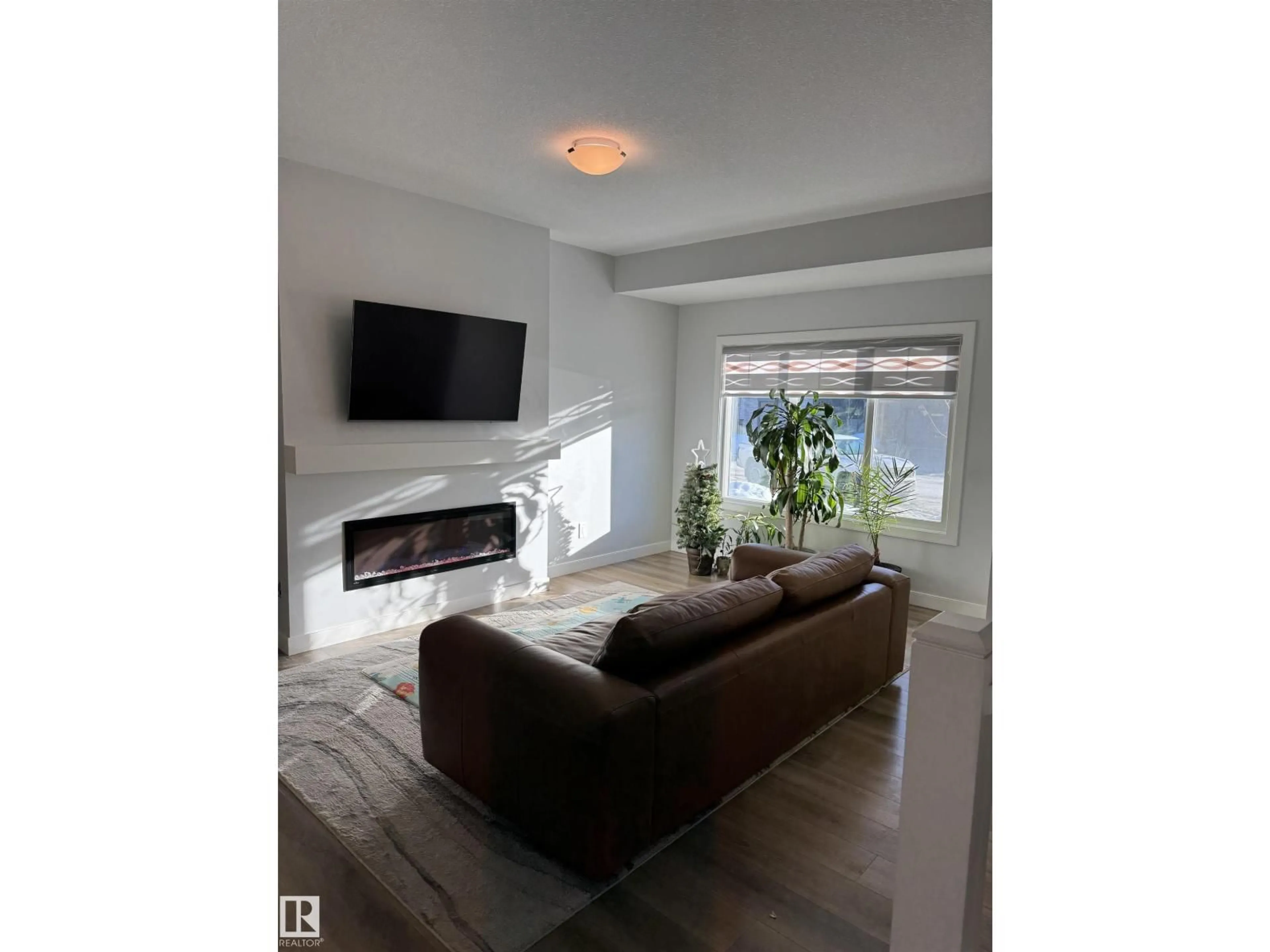 Living room with furniture, unknown for 858 NORTHERN HARRIER LN, Edmonton Alberta T5S0P8