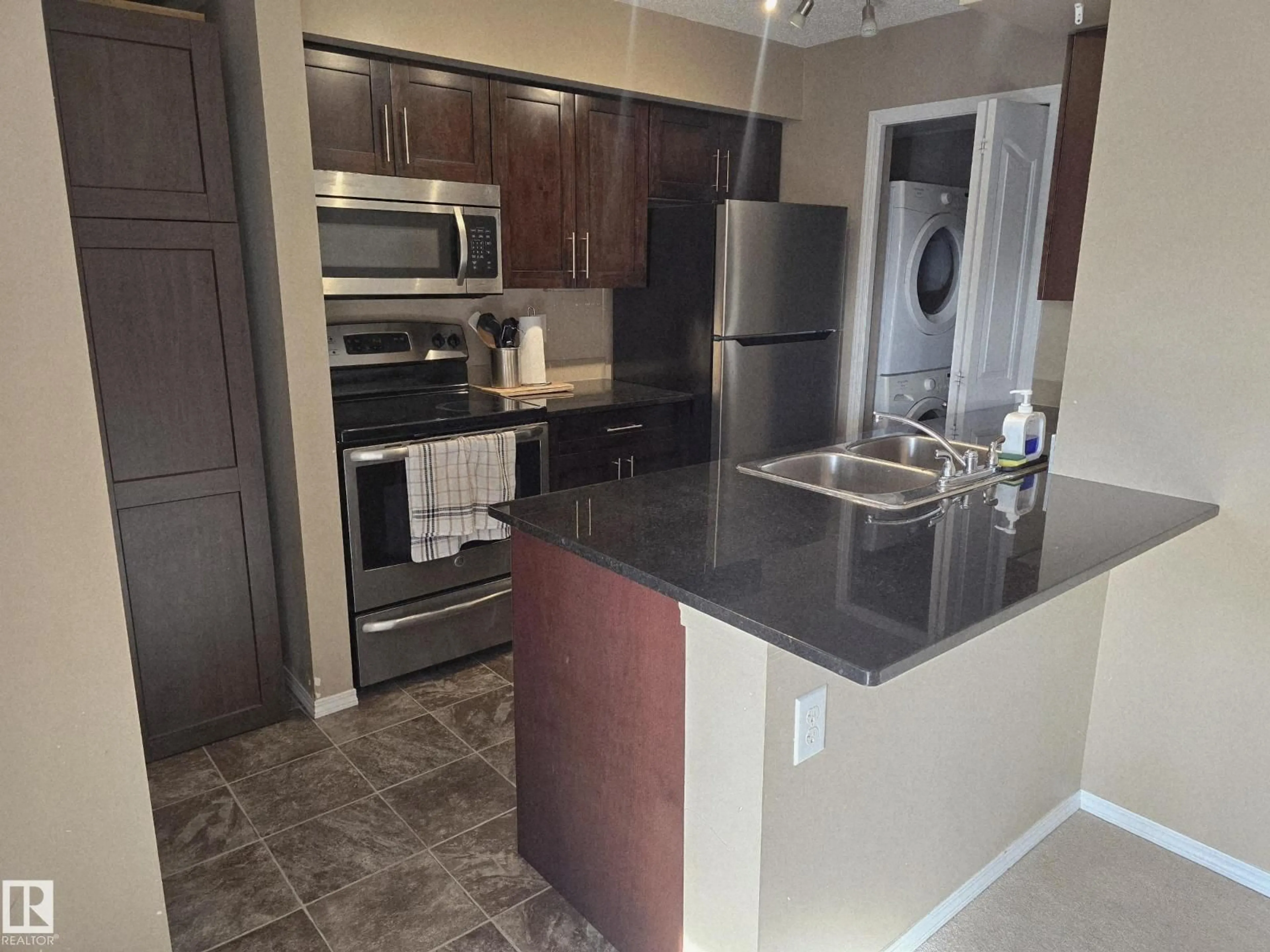 Open concept kitchen, unknown for #221 - 270 MCCONACHIE DR, Edmonton Alberta T5Y0X1