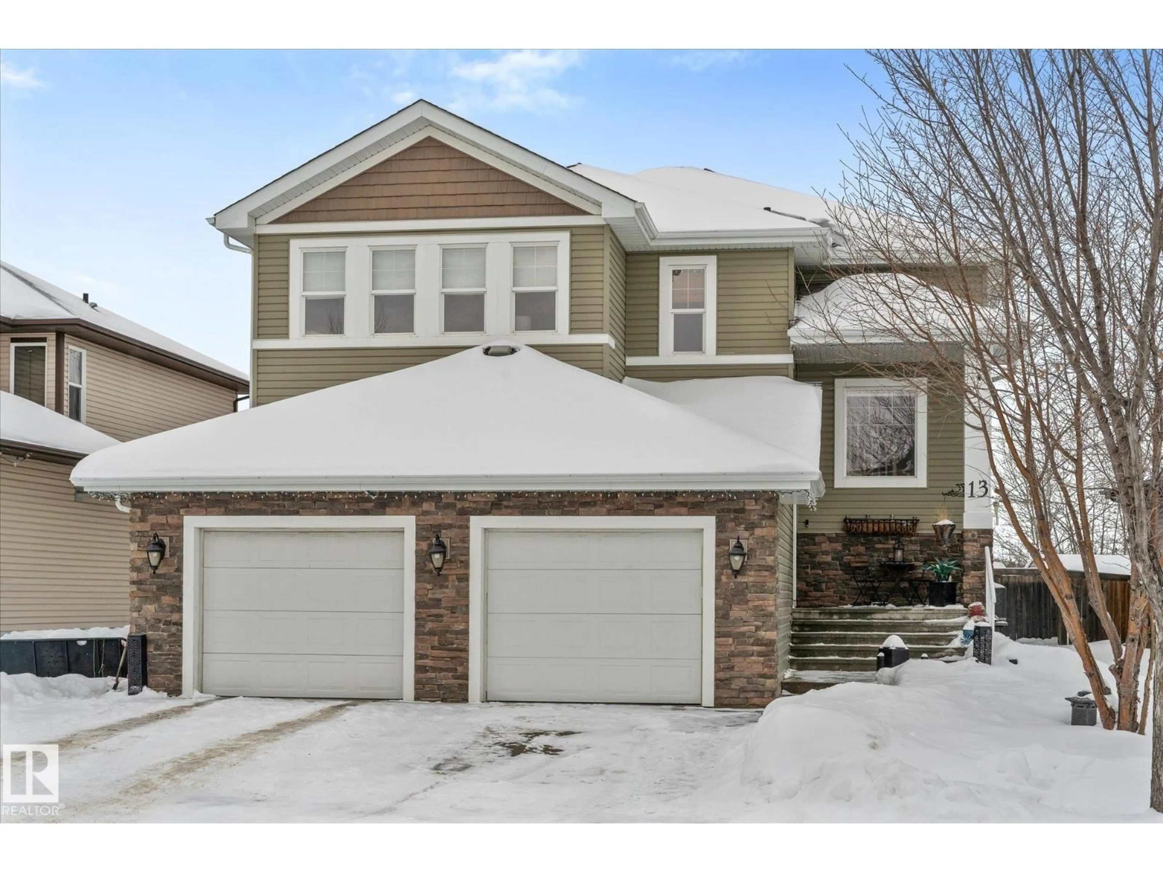 Home with vinyl exterior material, street for 13 HERON LINK, Spruce Grove Alberta T7X0E8