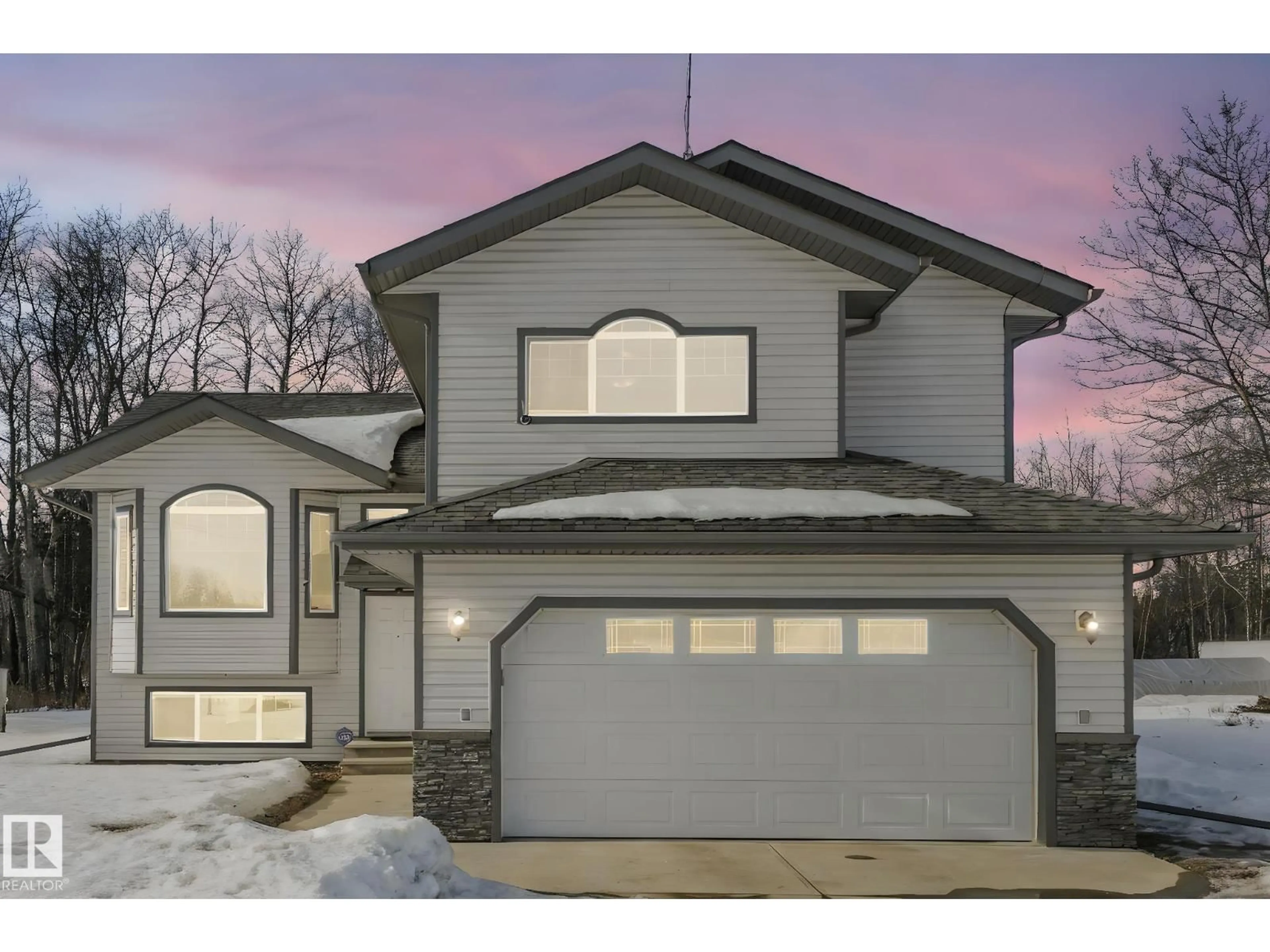 Home with vinyl exterior material, street for 58016 RR 214, Rural Thorhild County Alberta T0A3J0