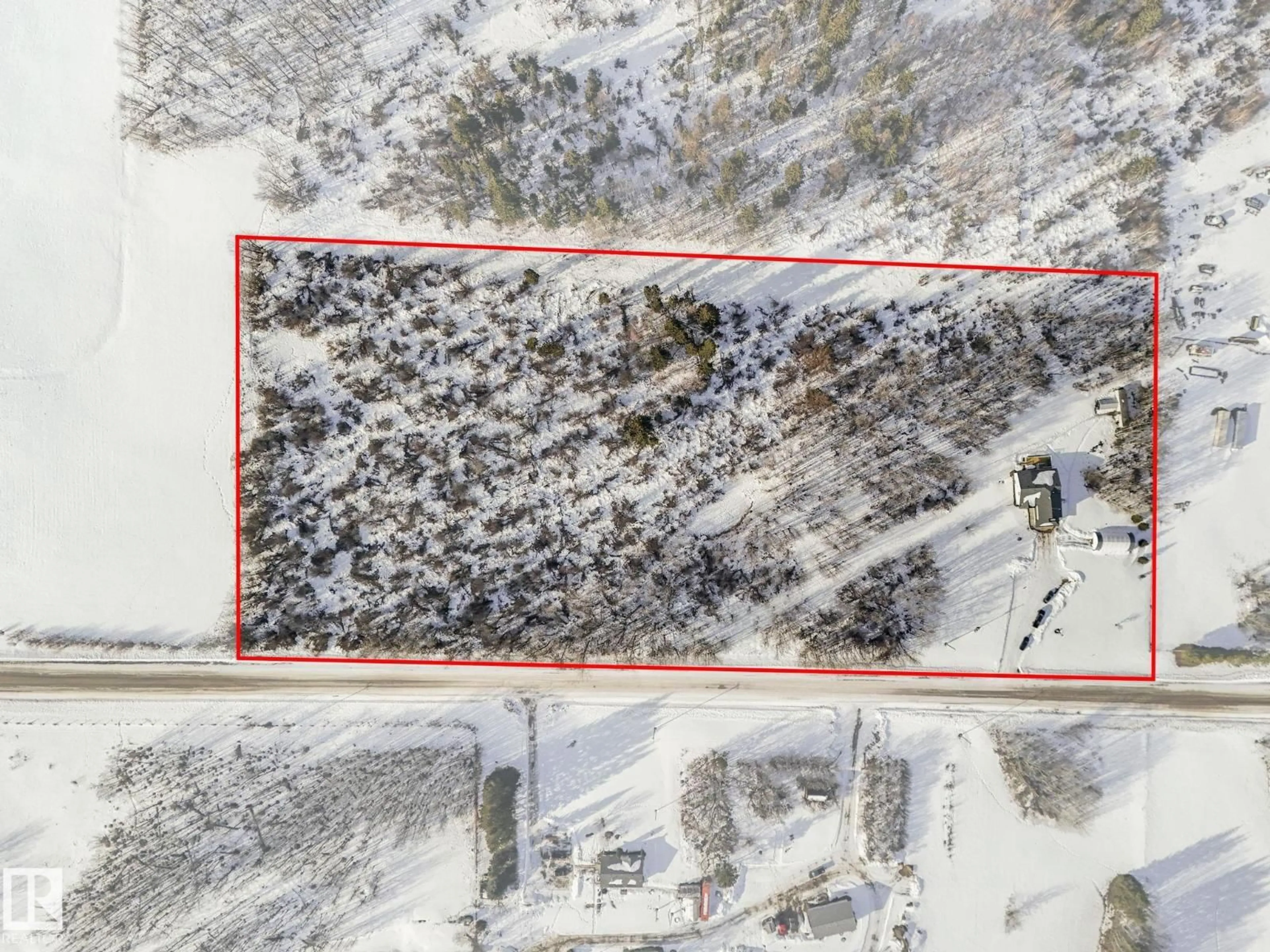 A pic from outside/outdoor area/front of a property/back of a property/a pic from drone, building for 58016 RR 214, Rural Thorhild County Alberta T0A3J0