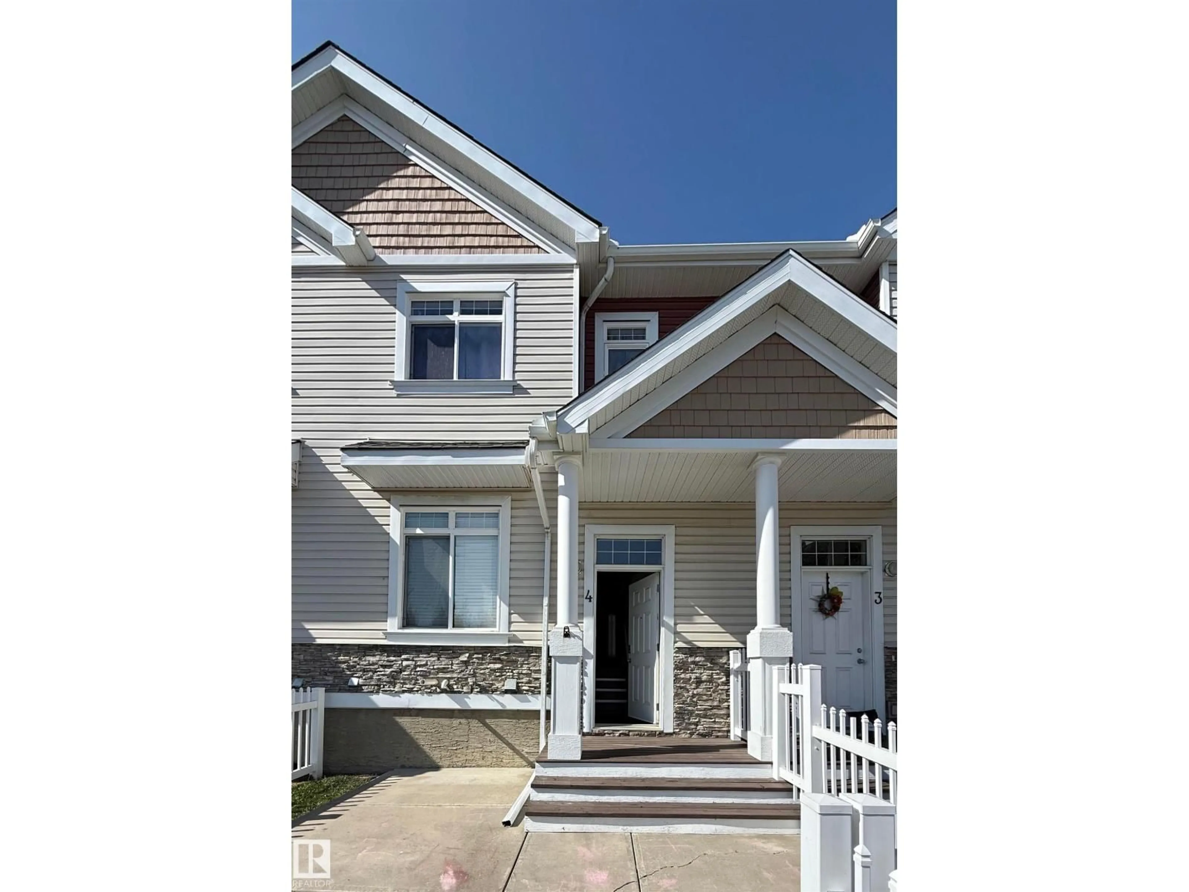 Home with vinyl exterior material, street for #4 - 1804 70 ST, Edmonton Alberta T6X0H4
