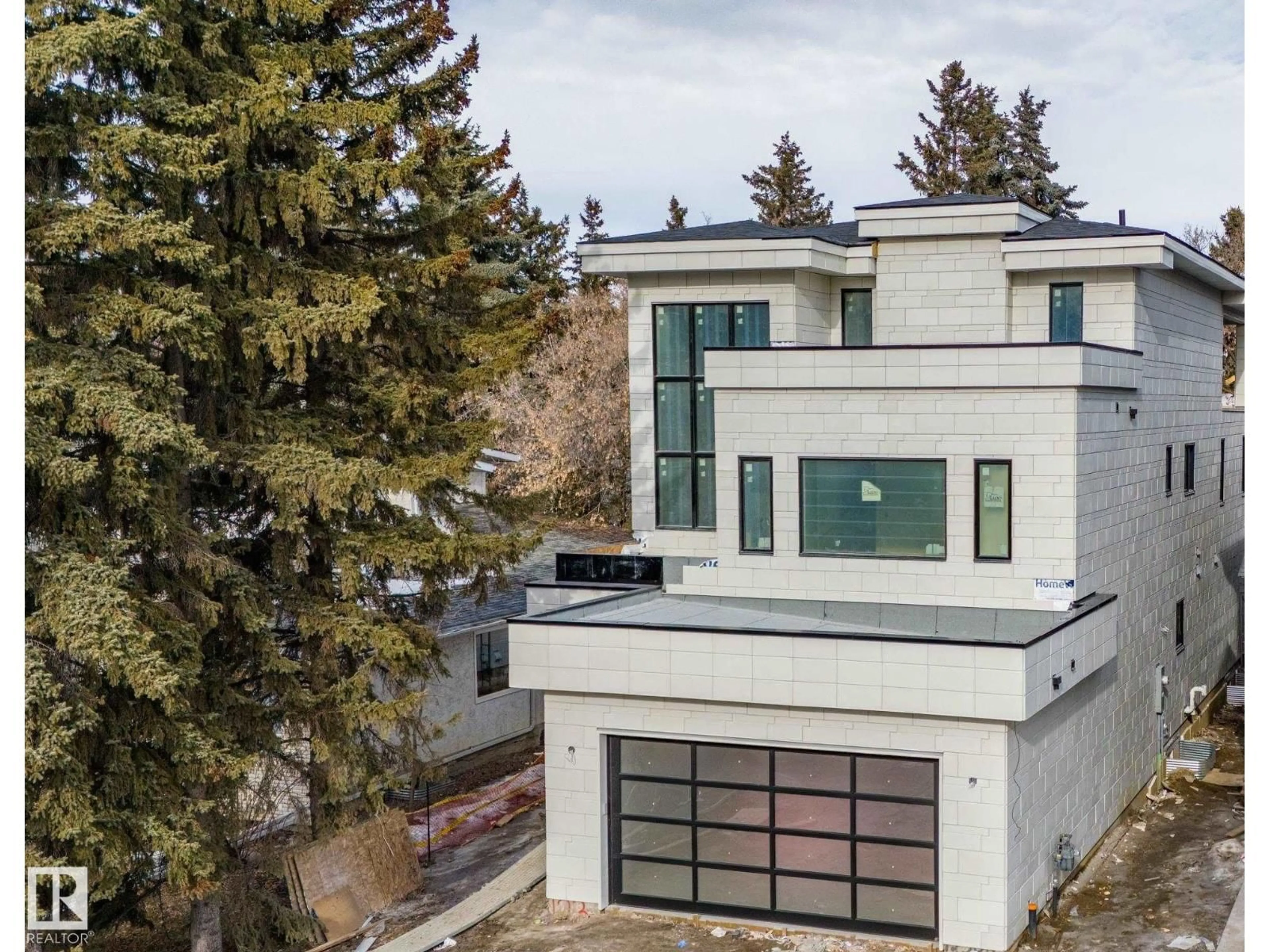 A pic from outside/outdoor area/front of a property/back of a property/a pic from drone, street for 12306 39 AV, Edmonton Alberta T6J0N2