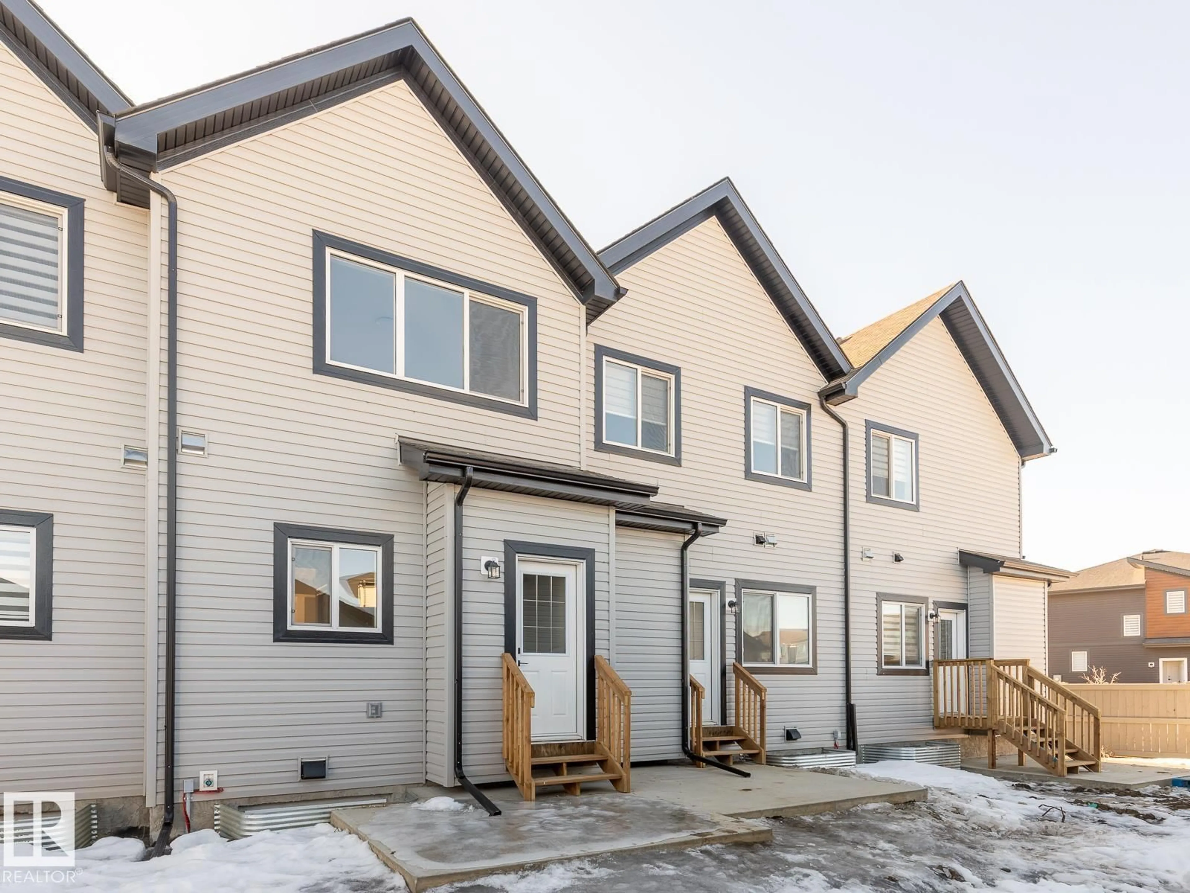 Home with vinyl exterior material, street for N - 90 DANSEREAU WY, Beaumont Alberta T4X3E2