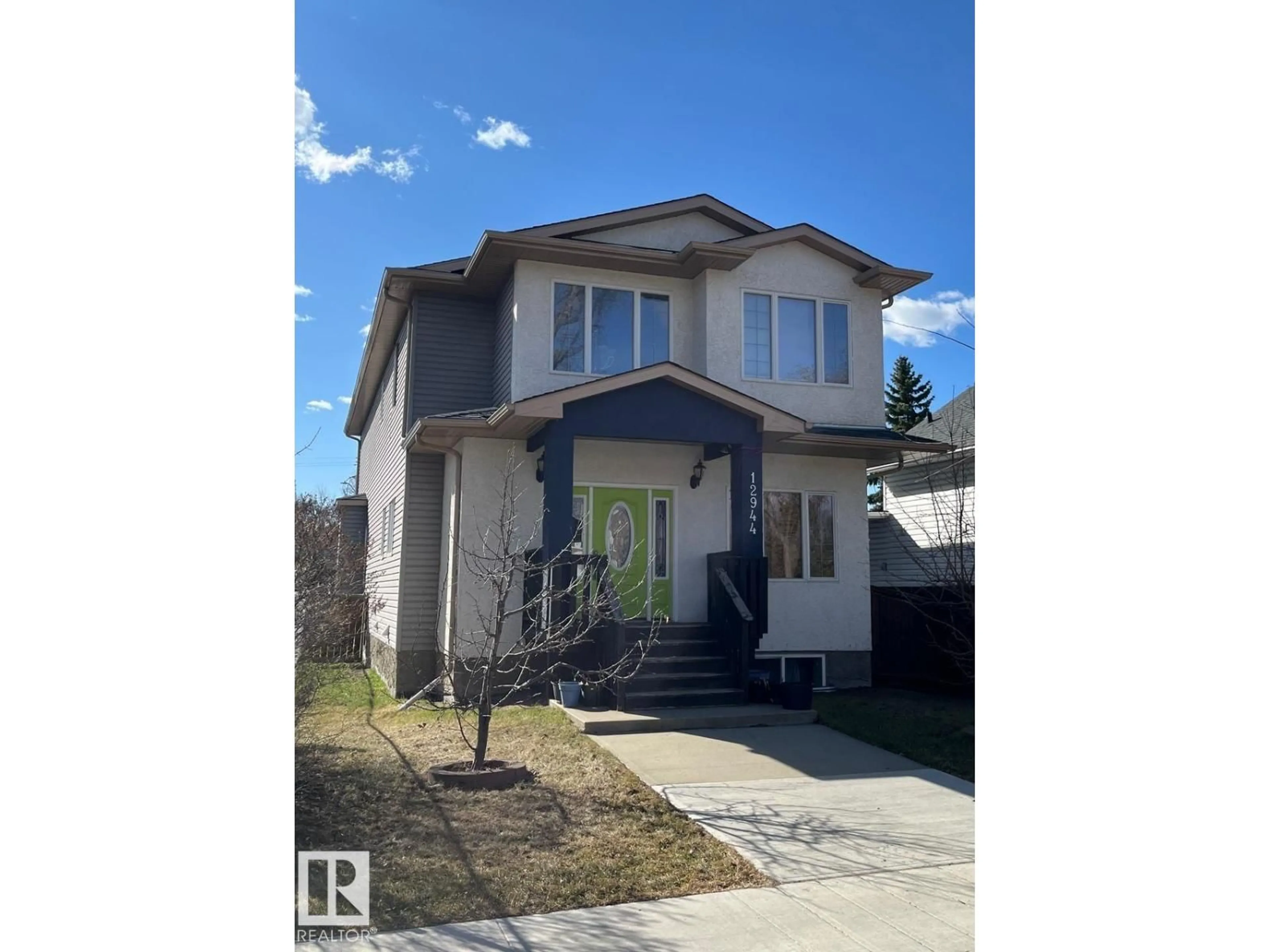 Home with vinyl exterior material, street for NW - 12944 119 ST, Edmonton Alberta T5E5M4