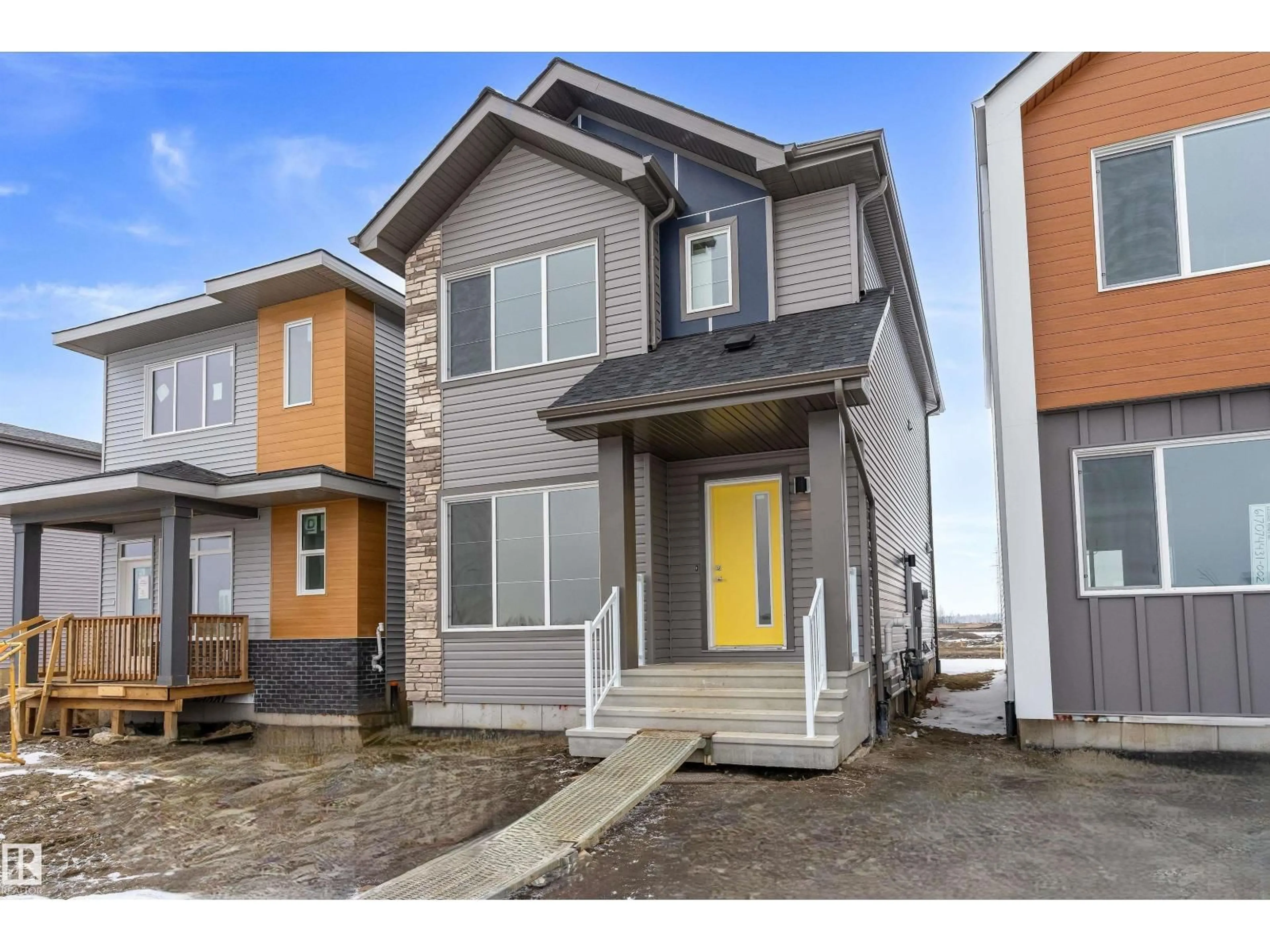 Home with vinyl exterior material, street for NE - 428 176 AV, Edmonton Alberta T5Y4J7