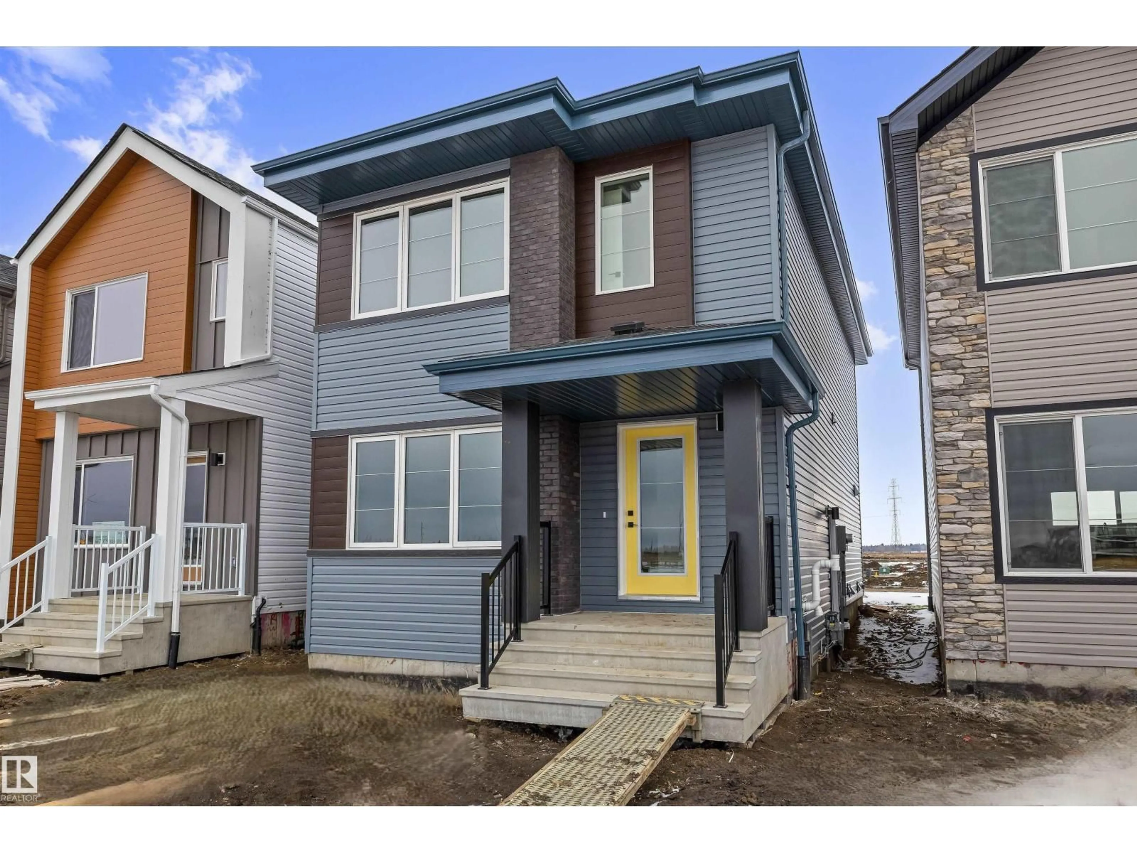 Home with brick exterior material, street for NE - 436 176 AV, Edmonton Alberta T5Y4J7