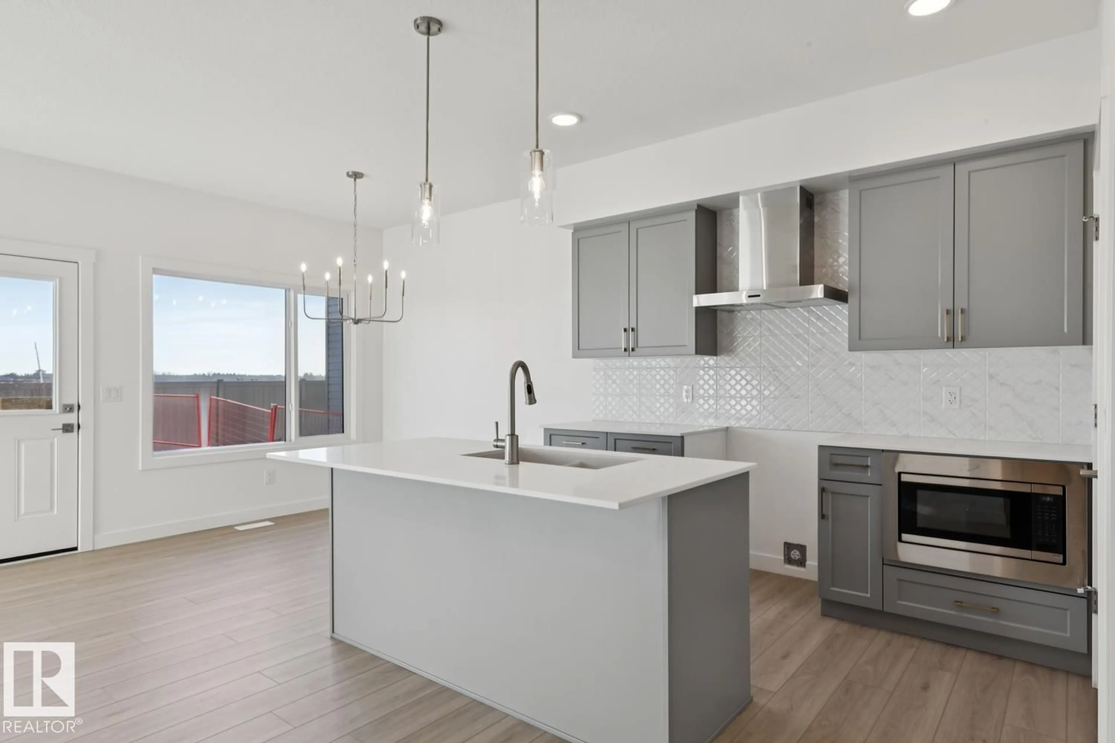 Open concept kitchen, unknown for 8616 183 AV, Edmonton Alberta T5Z0X5