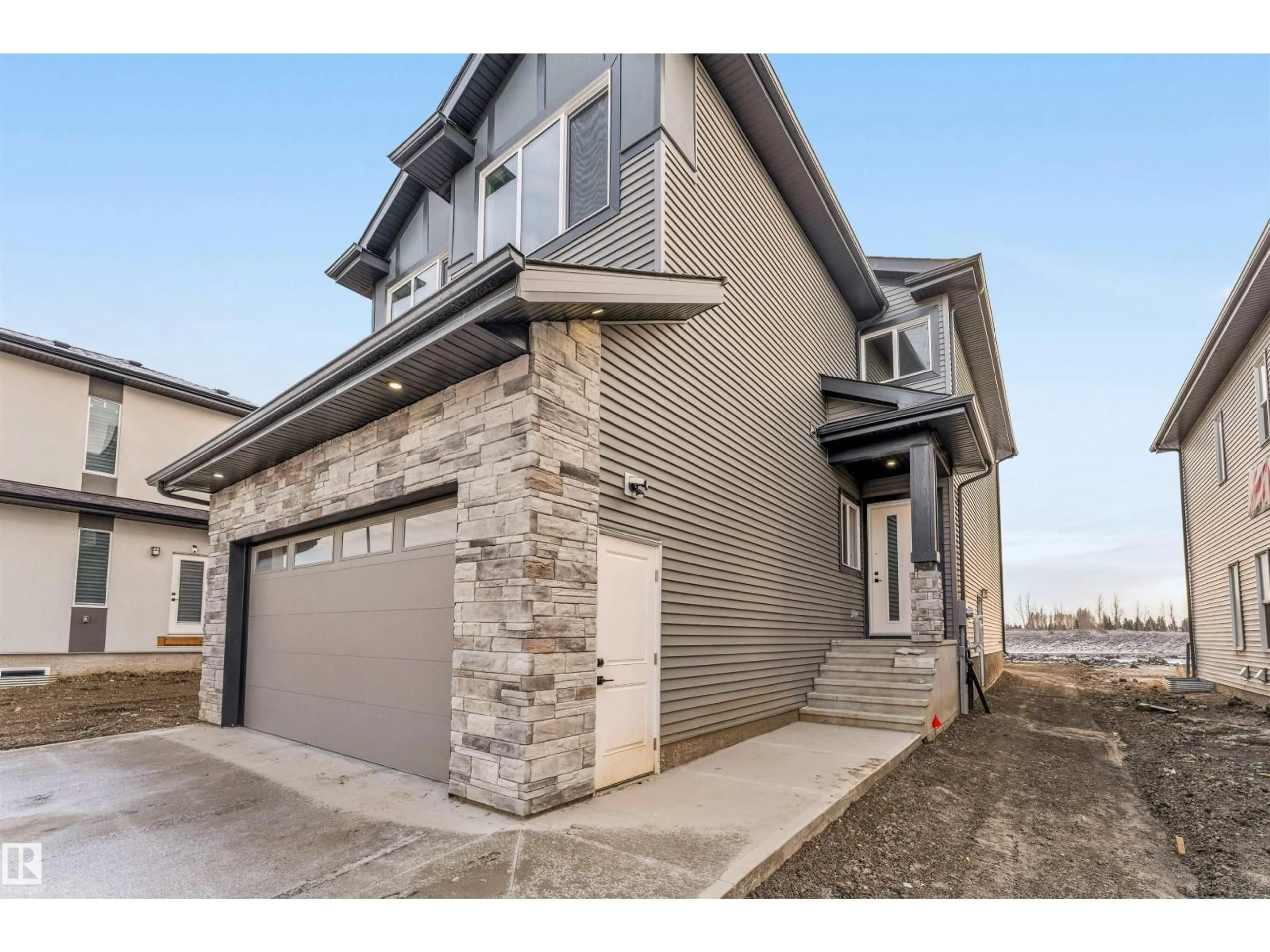 Home with brick exterior material, street for 1939 63 AV, Rural Leduc County Alberta T4X3C9