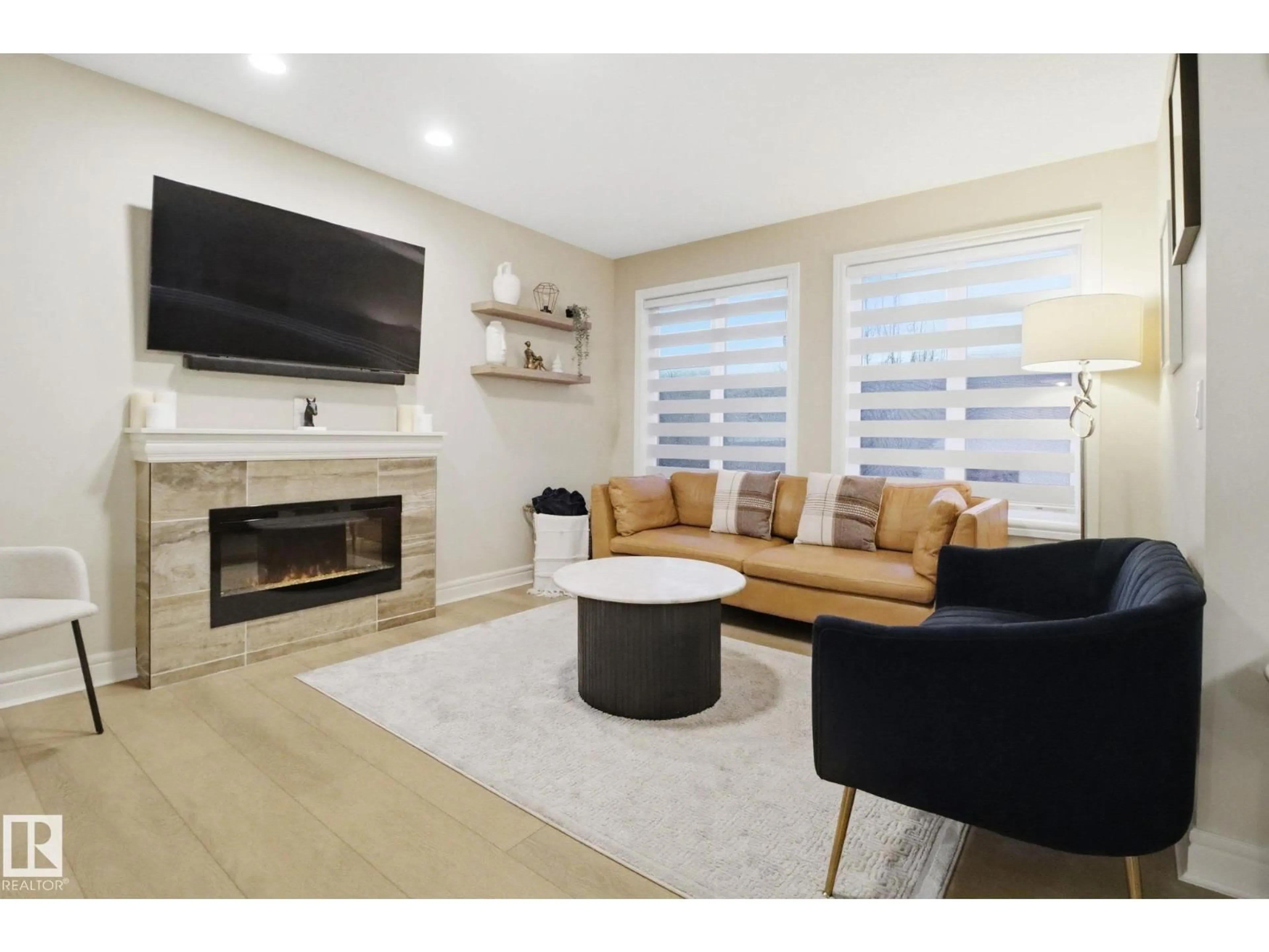 Living room with furniture, unknown for SW - 1418 169 ST, Edmonton Alberta T6W3P7