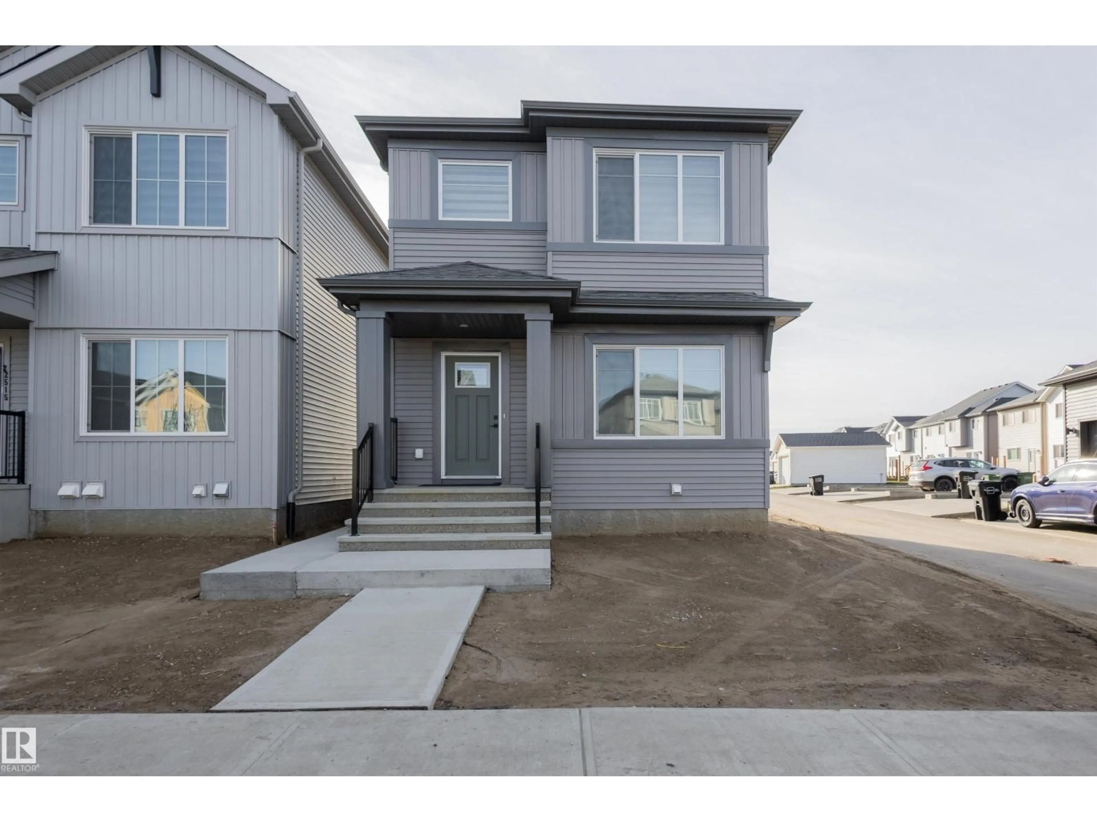 Home with vinyl exterior material, street for 22519 88 AV, Edmonton Alberta T5T7H8