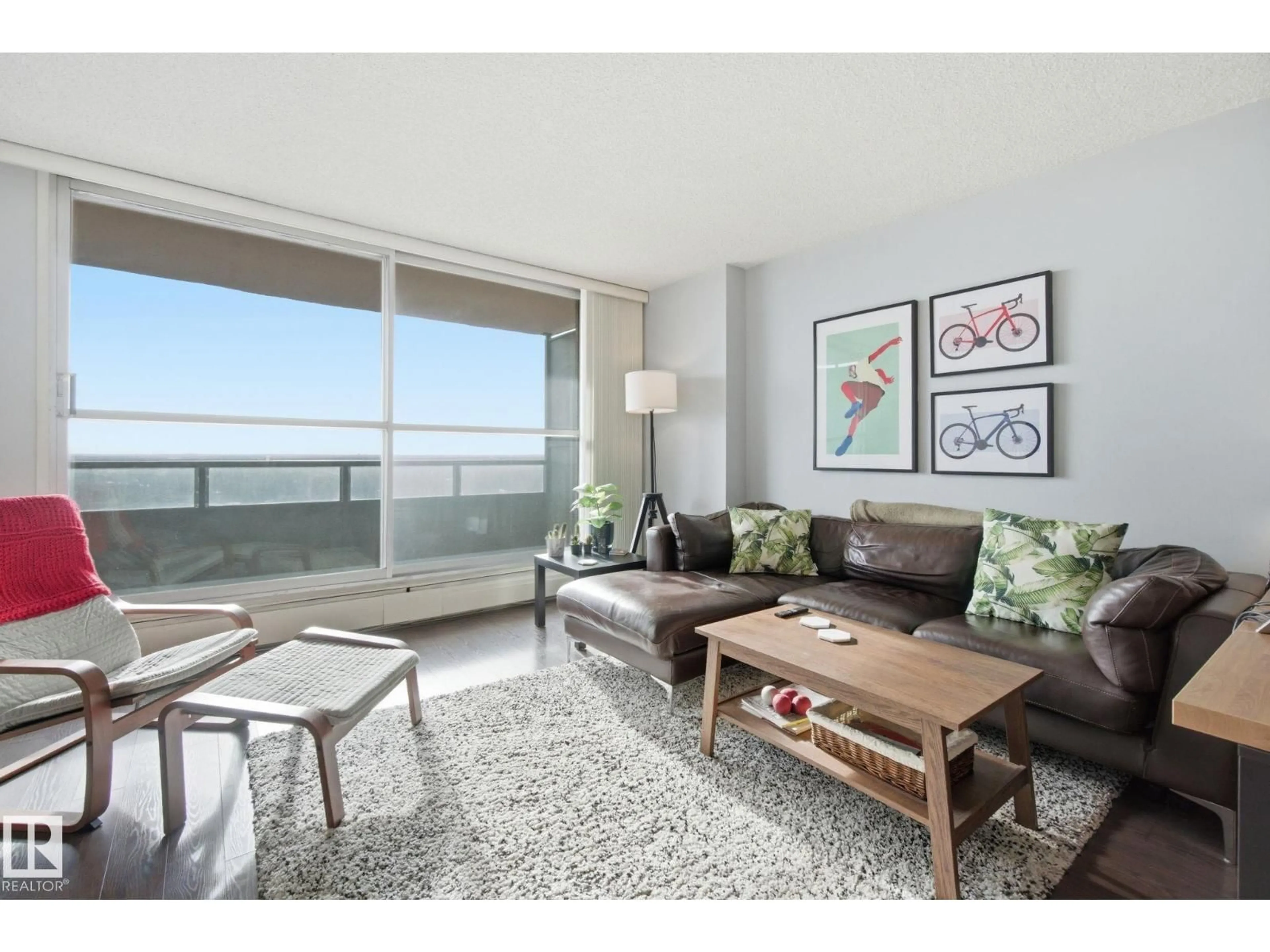 Living room with furniture, unknown for 1312 STONY PLAIN RD, Edmonton Alberta T5N3R2