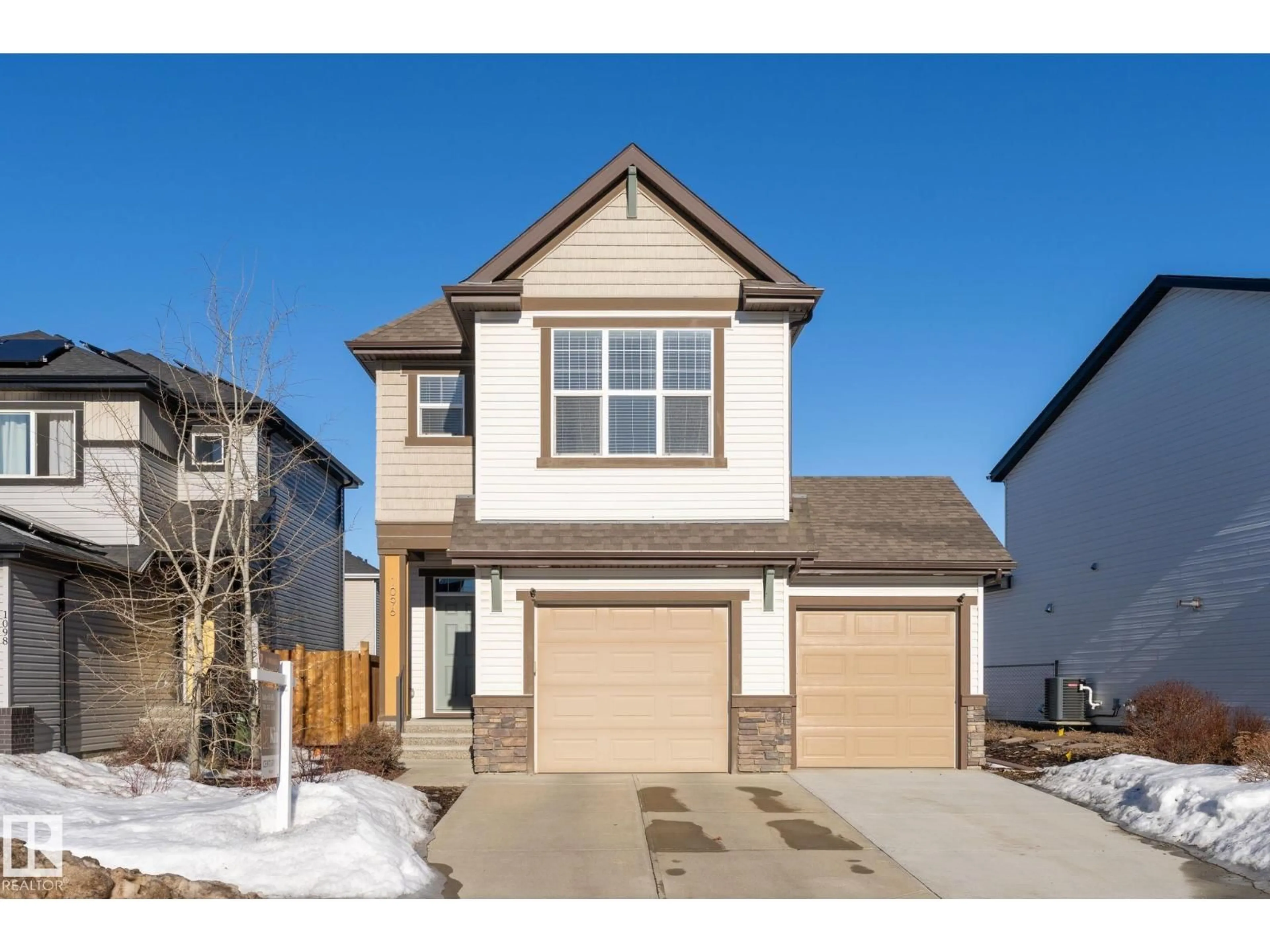 Home with vinyl exterior material, street for NW - 1096 SECORD PROMENADE, Edmonton Alberta T5T7B1