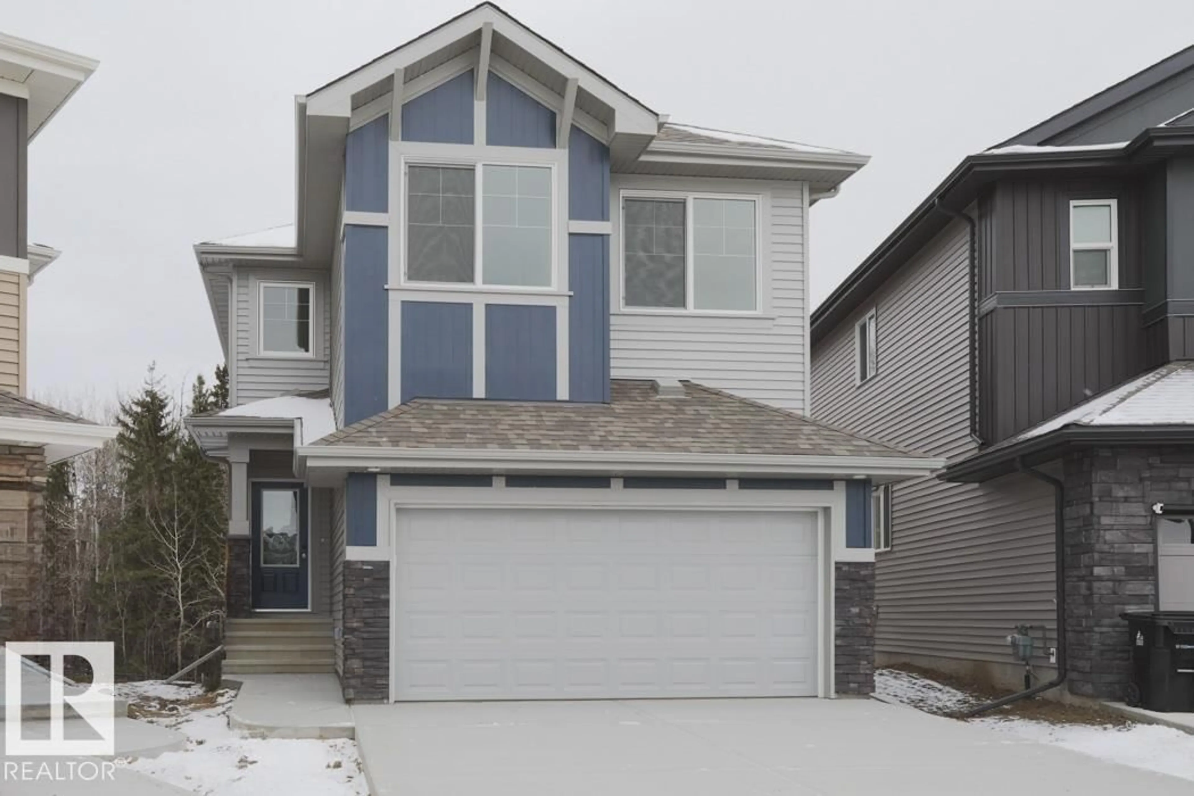 Home with vinyl exterior material, street for 17943 63 ST, Edmonton Alberta T5T1L6