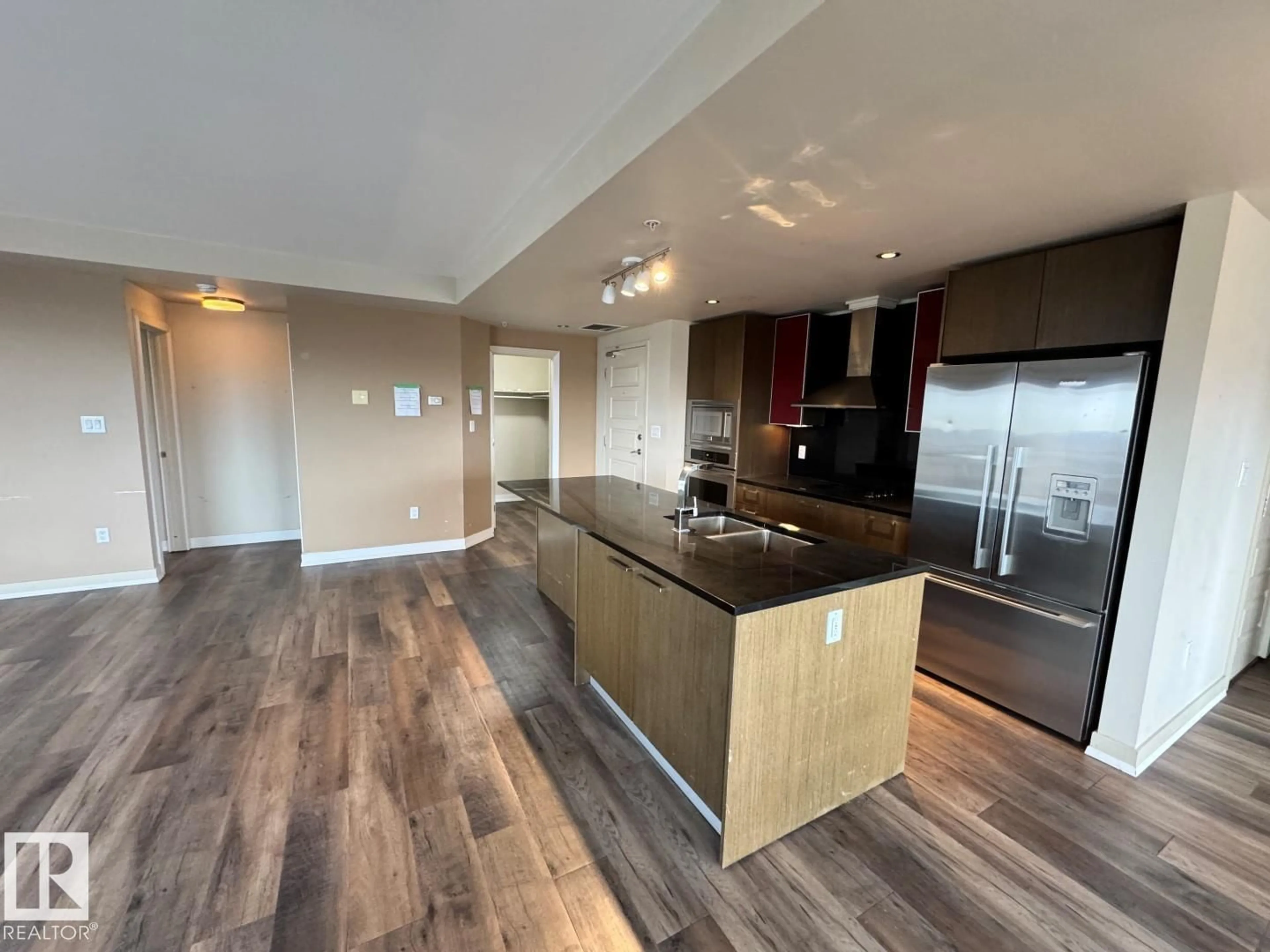 Open concept kitchen, wood/laminate floor for 10388 - 1804 105 ST, Edmonton Alberta T5J0C2