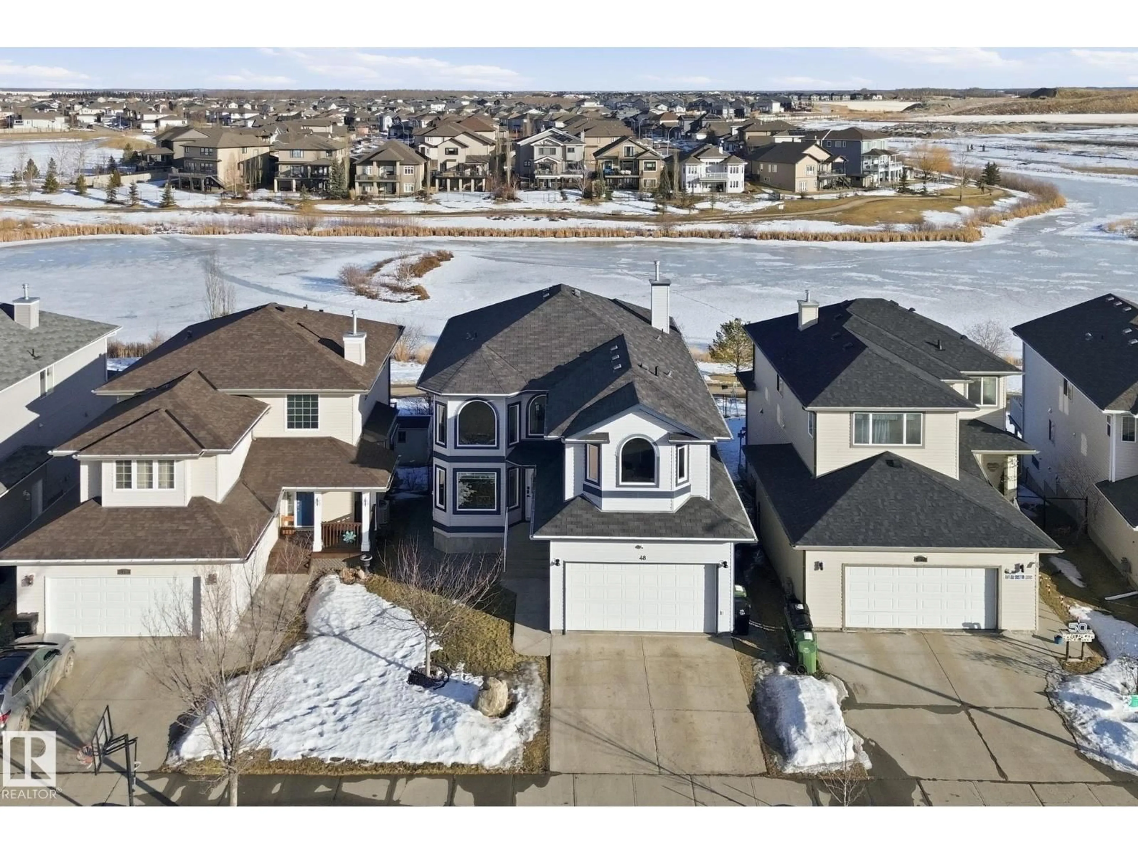 A pic from outside/outdoor area/front of a property/back of a property/a pic from drone, street for 48 DOUGLAS CR, Leduc Alberta T9E8P4