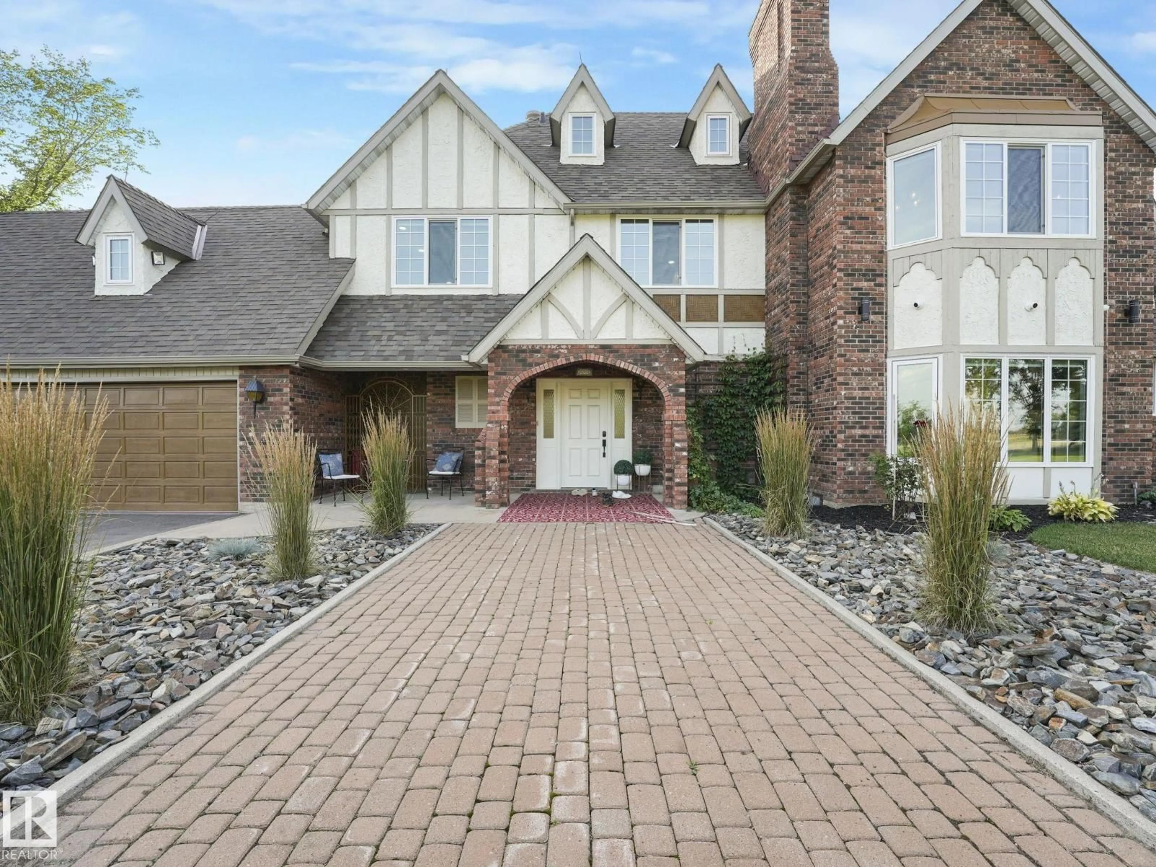 Home with brick exterior material, street for 5 54509 RGE RD 232, Rural Sturgeon County Alberta T8L5E9